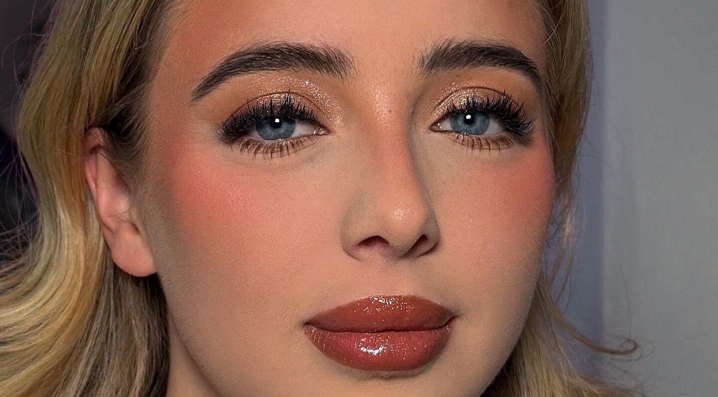 Glamour makeup by Makeupbykian in Liverpool, England, GB highlighting bold eyes and glossy lips.