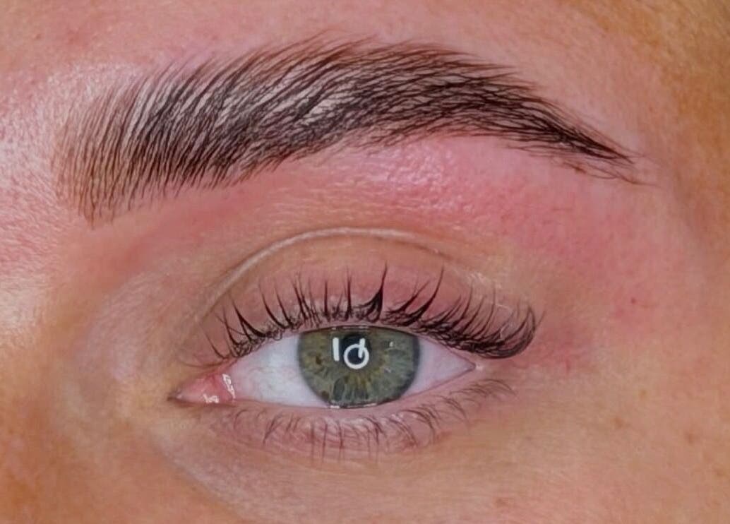 Close-up of perfectly groomed eyebrow and eyelashes at Makeupbykian, Liverpool, England, GB.