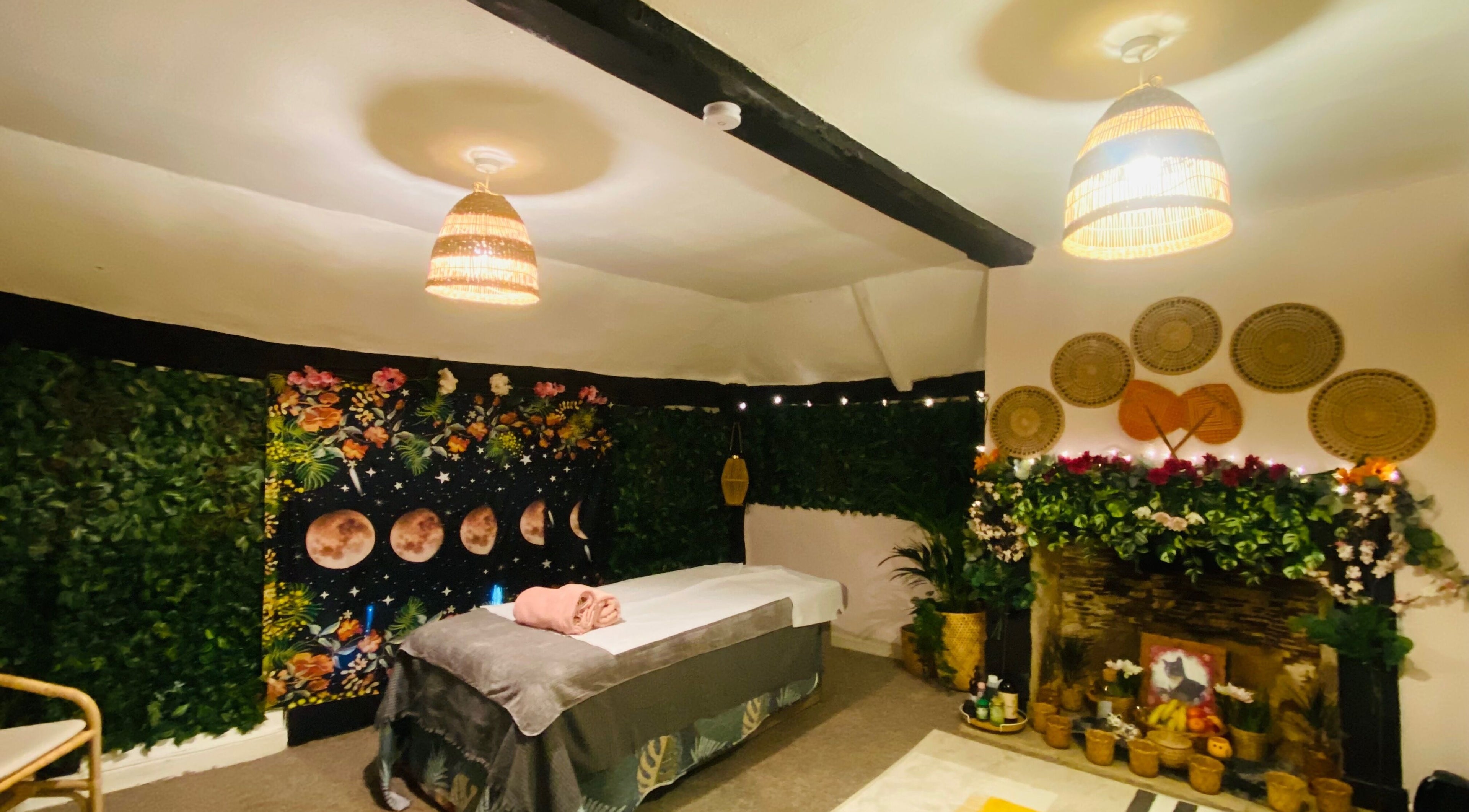 Tranquil therapy room at Reset Holistic Limited, Wilton, England, GB, featuring plants and calming decor.