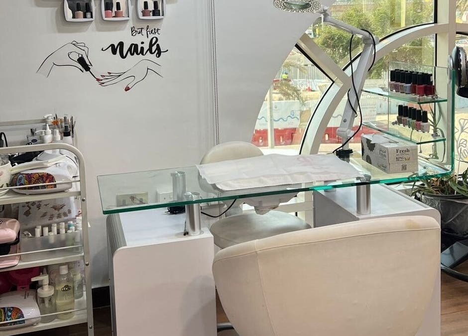 Elegant nail station at Du Monde Ladies Beauty Salon, Abu Dhabi, AE, showcasing modern nail care setup.