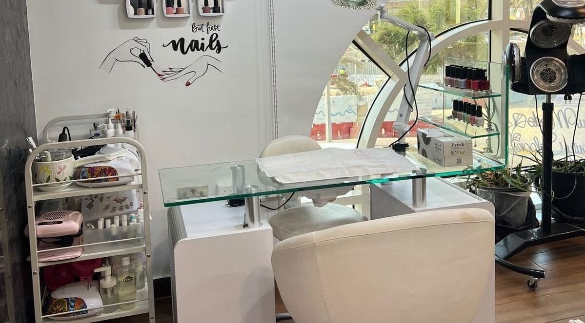 Elegant nail station at Du Monde Ladies Beauty Salon, Abu Dhabi, AE, showcasing modern nail care setup.