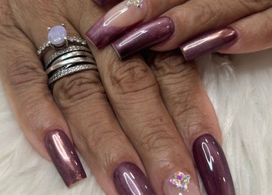 Elegant purple and glitter nail design by Nailsbyflor in New York, New York, US, showcasing detailed artistry.