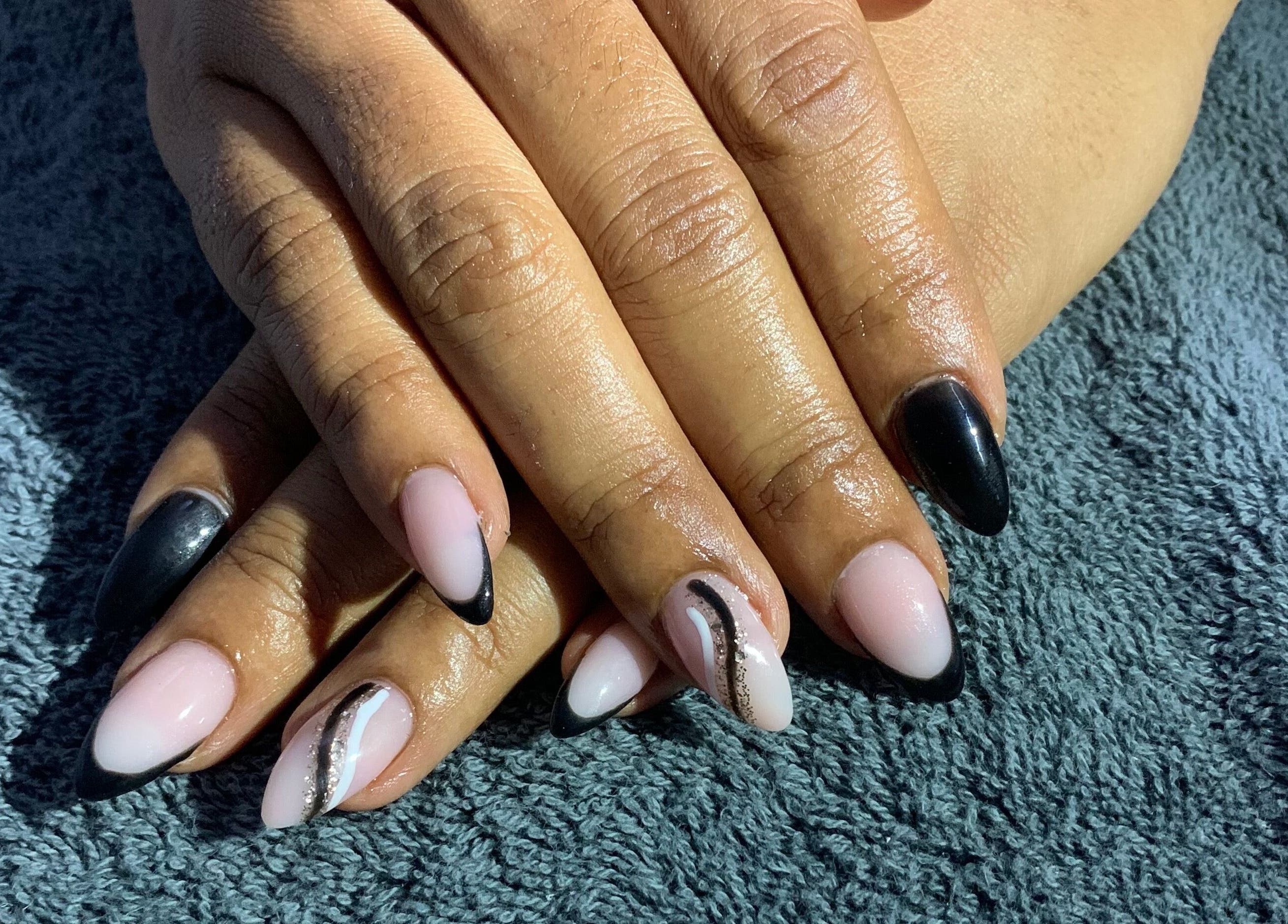 Elegant black and pink nail art at Eunoia Studio, Saint John's, Saint John, AG.