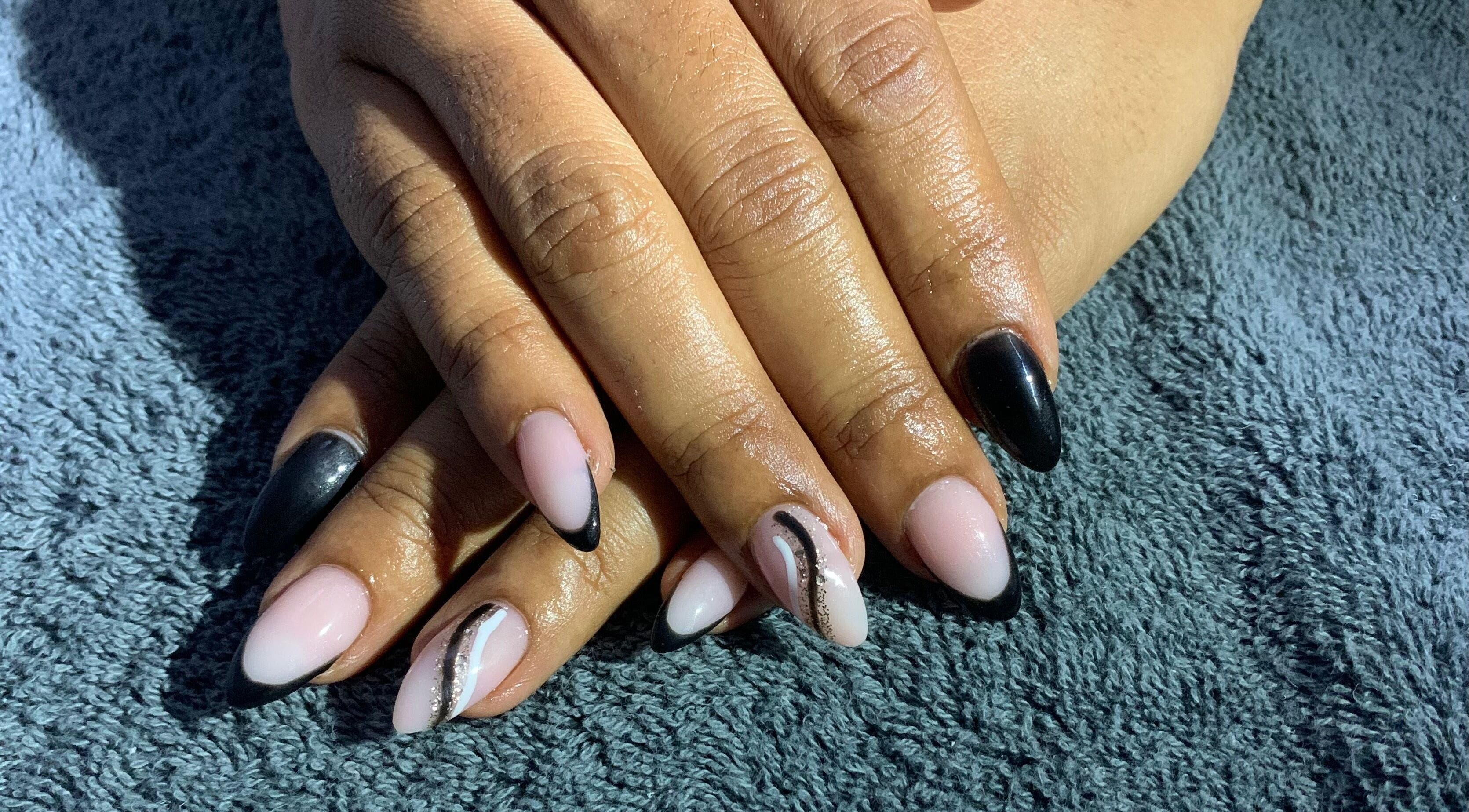 Elegant black and pink nail art at Eunoia Studio, Saint John's, Saint John, AG.