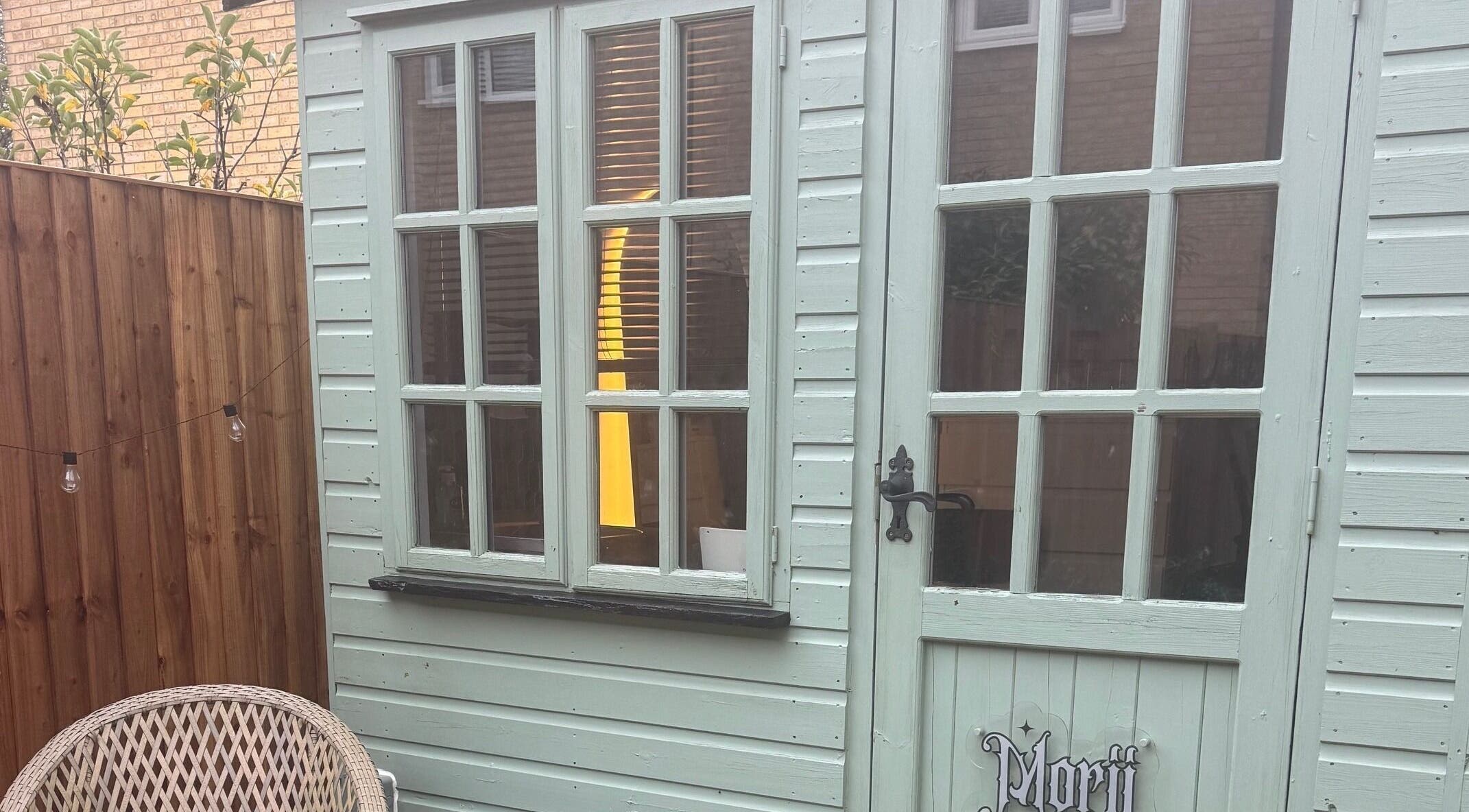Charming Morii Tattoos entrance at Great Notley, England, featuring vintage decor and inviting wooden door.