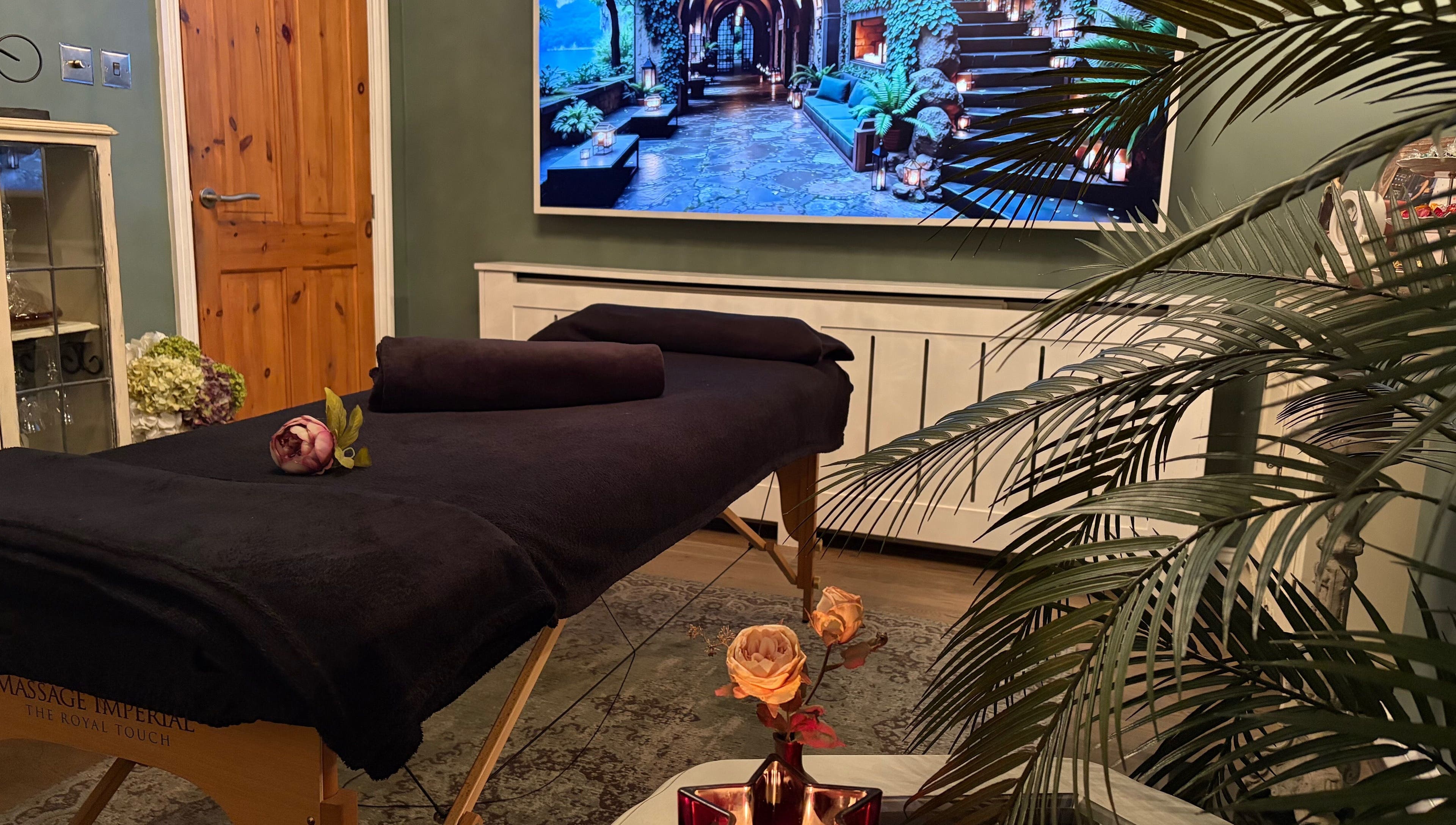 Relaxing massage room at Anna Mason Massage Therapy, Bromley, England, GB with dim lighting and cozy decor.