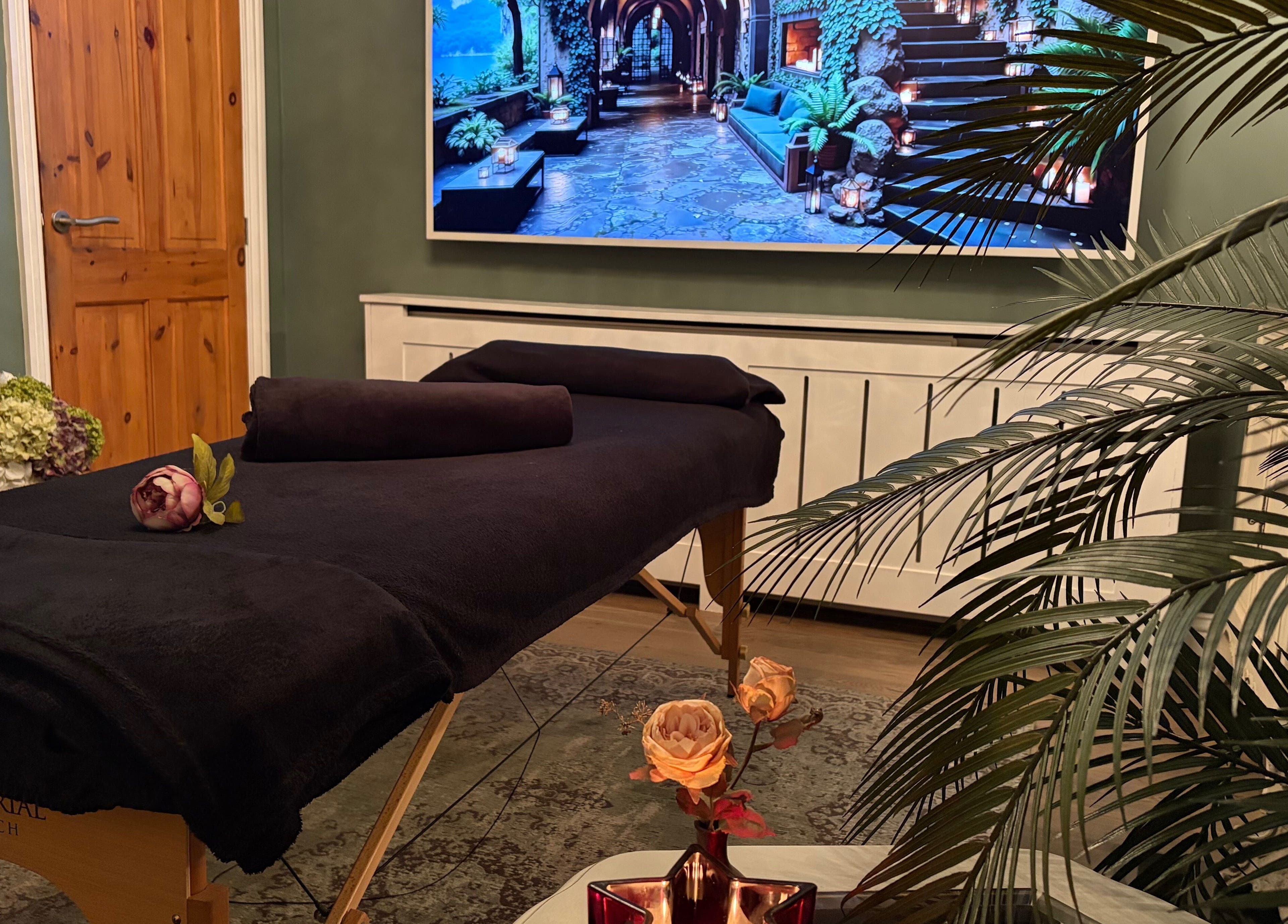 Relaxing massage room at Anna Mason Massage Therapy, Bromley, England, GB with dim lighting and cozy decor.