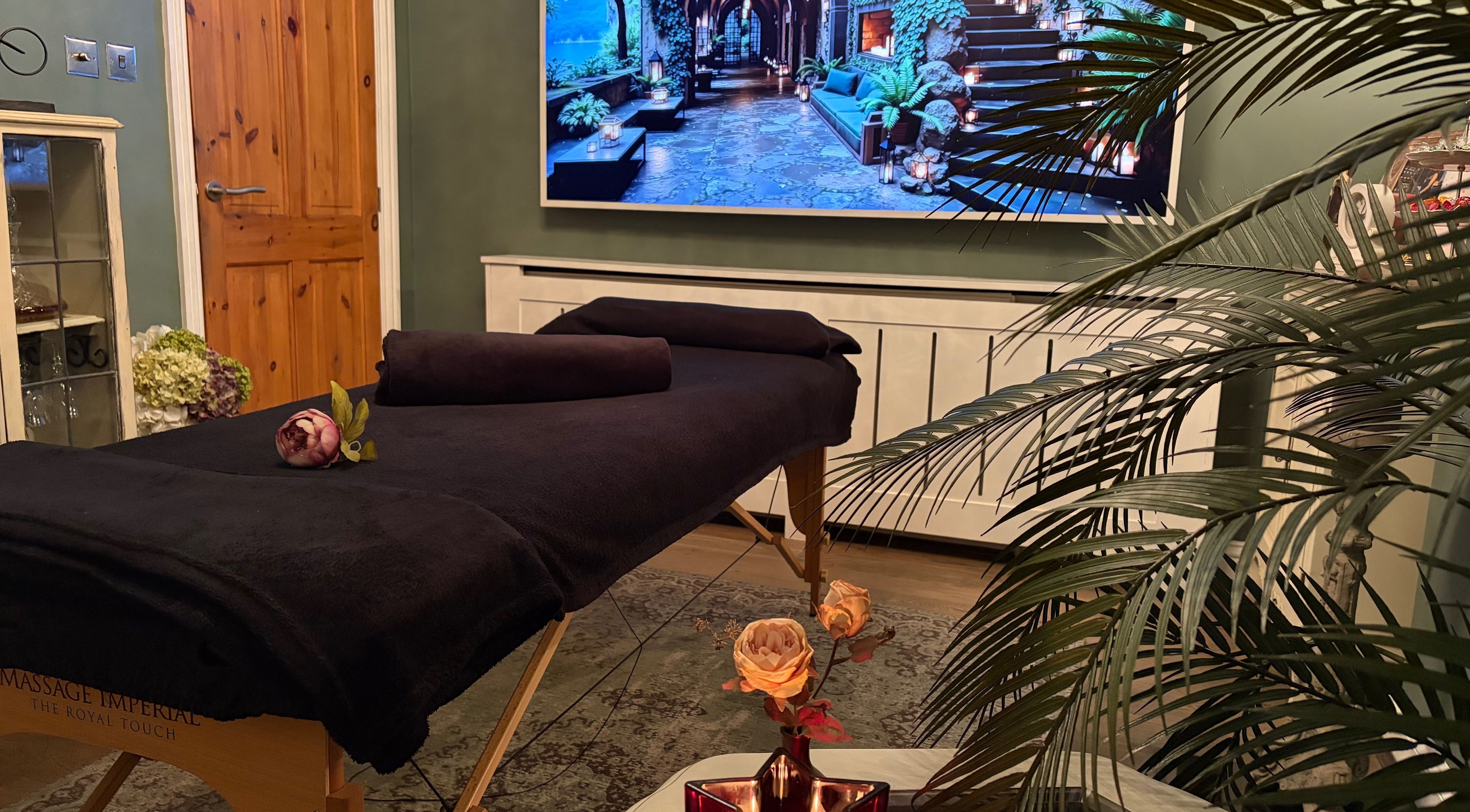 Relaxing massage room at Anna Mason Massage Therapy, Bromley, England, GB with dim lighting and cozy decor.