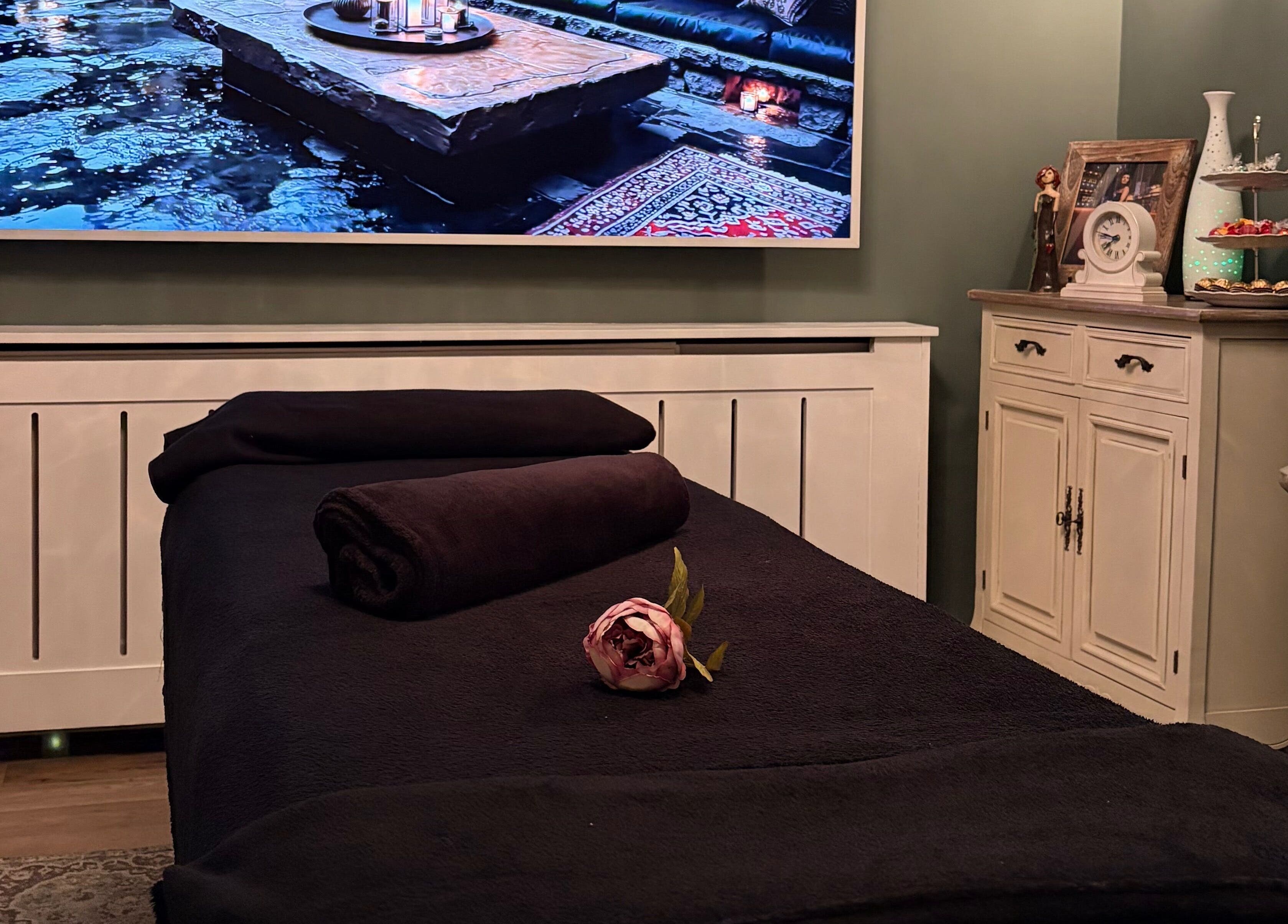 Relaxing massage room setup at Anna Mason Massage Therapy, Bromley, England, GB with elegant decor.