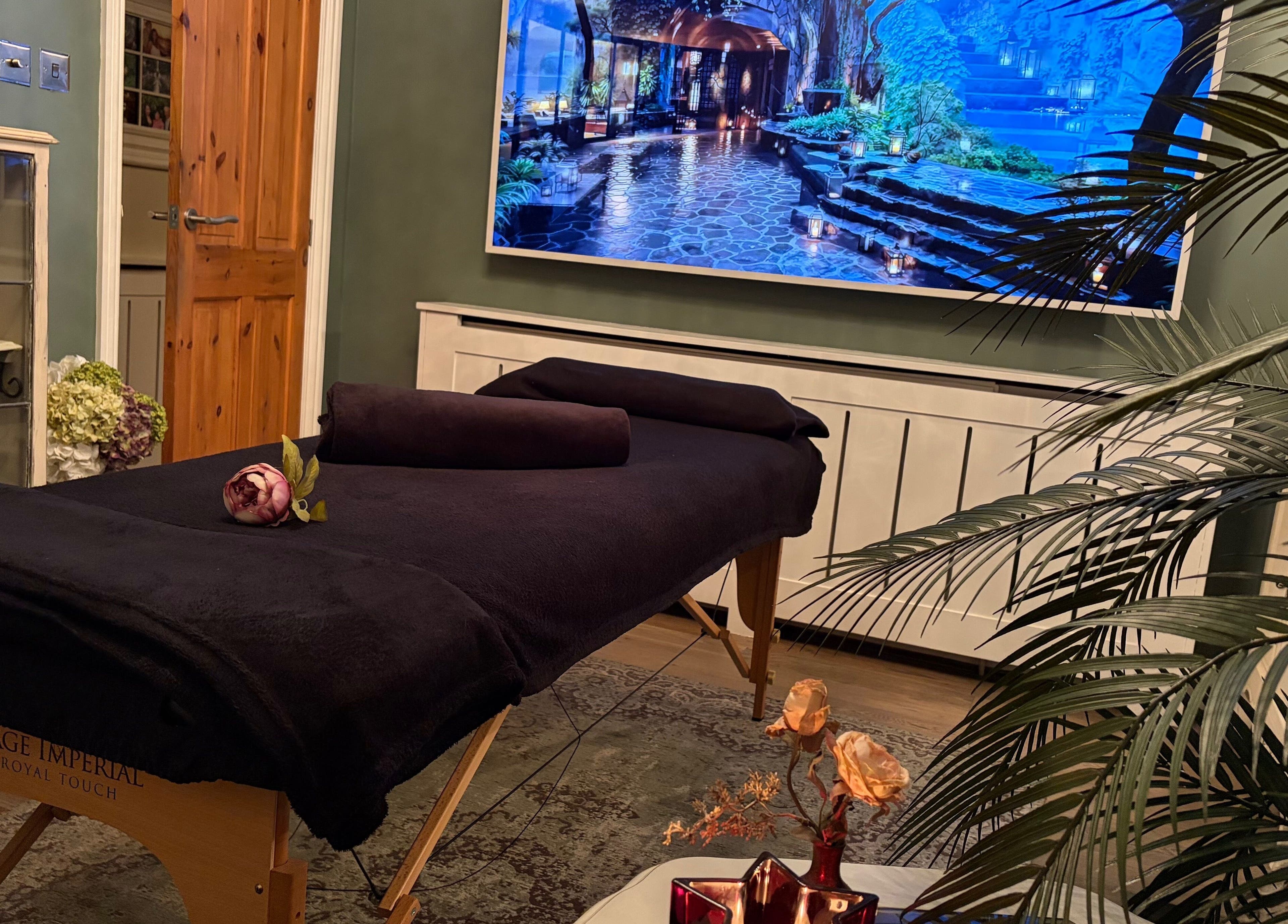 Cozy massage room at Anna Mason Massage Therapy, Bromley, England, GB with elegant decor.