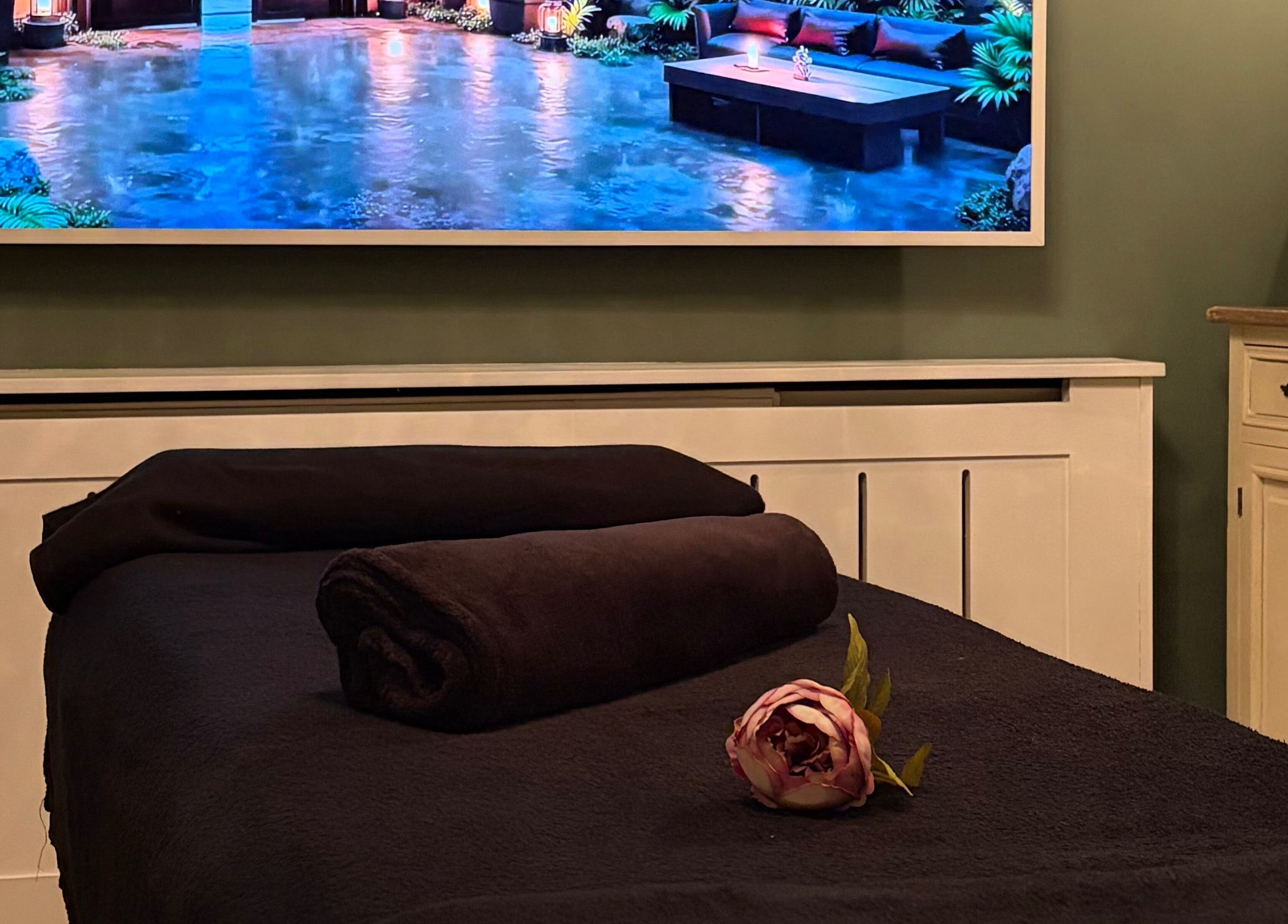 Cozy massage room at Anna Mason Massage Therapy, Bromley, England, GB, with plush bed and tranquil decor.