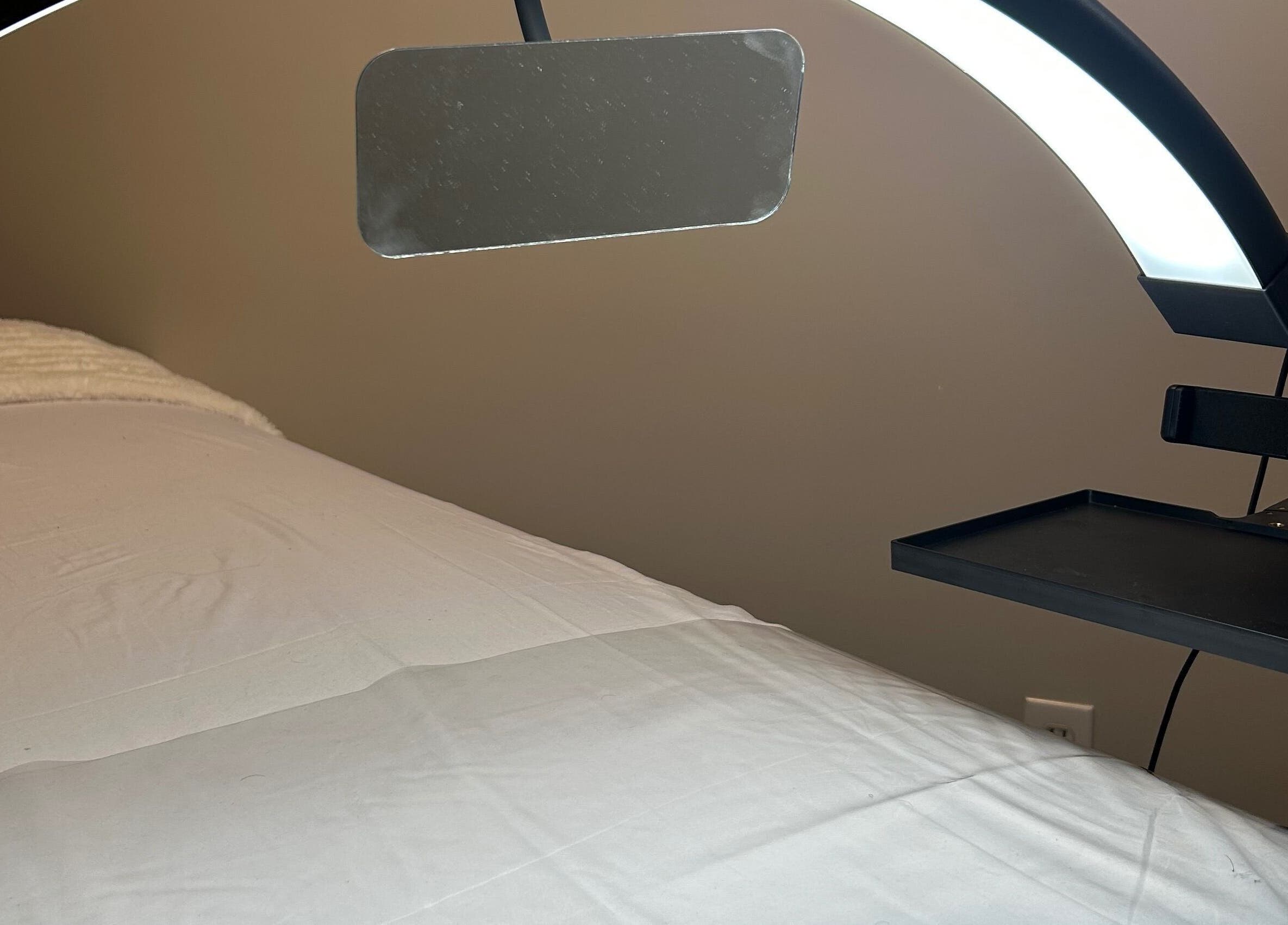 Relaxing treatment room setup at Advanced Beautique, Vaughan, Ontario, CA, highlighting comfort and elegance.