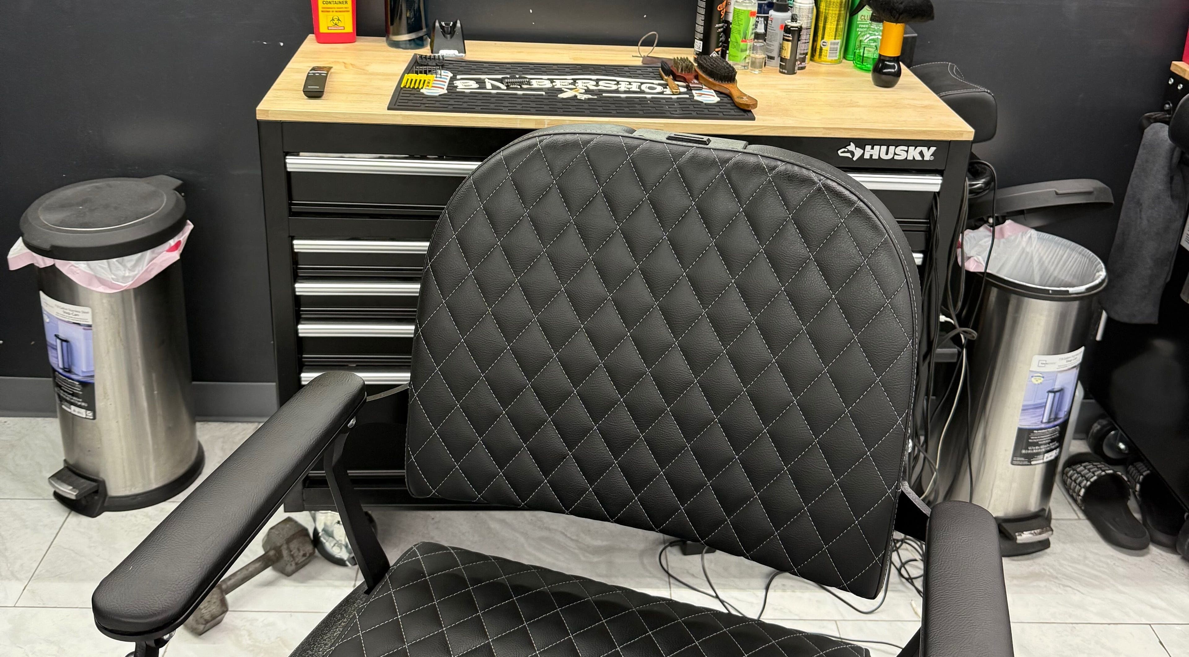 Sleek barber chair and tools at Immaculate Kutz, Baldwin, New York, US, offering a premium grooming experience.