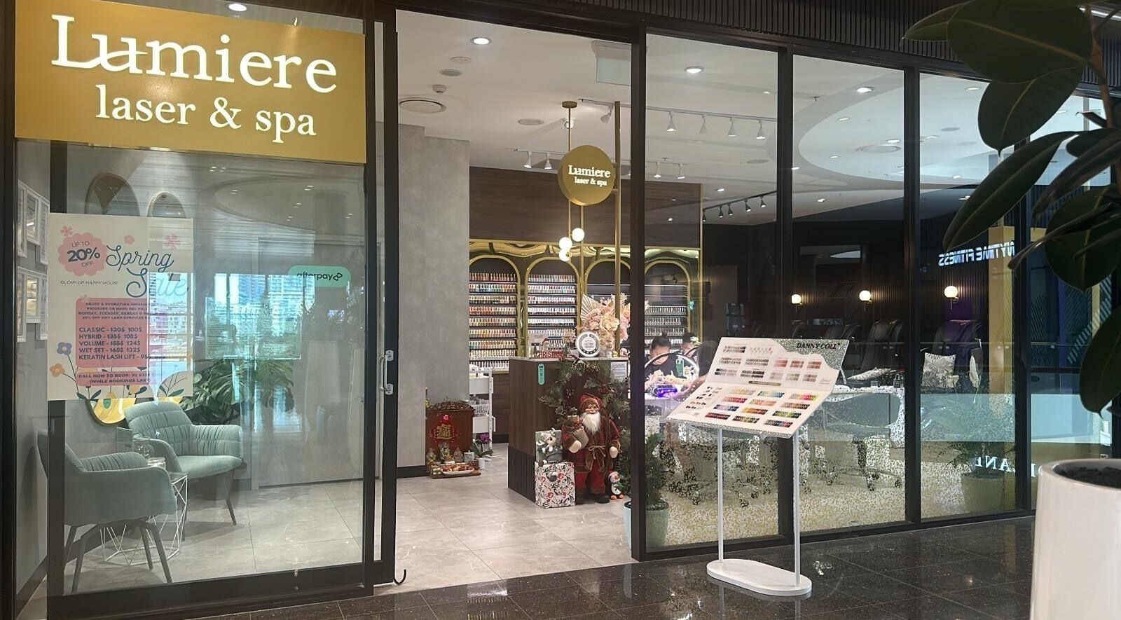 Front entrance of Lumière Laser & Spa in Wentworth Point, New South Wales, AU showcasing elegant interior.