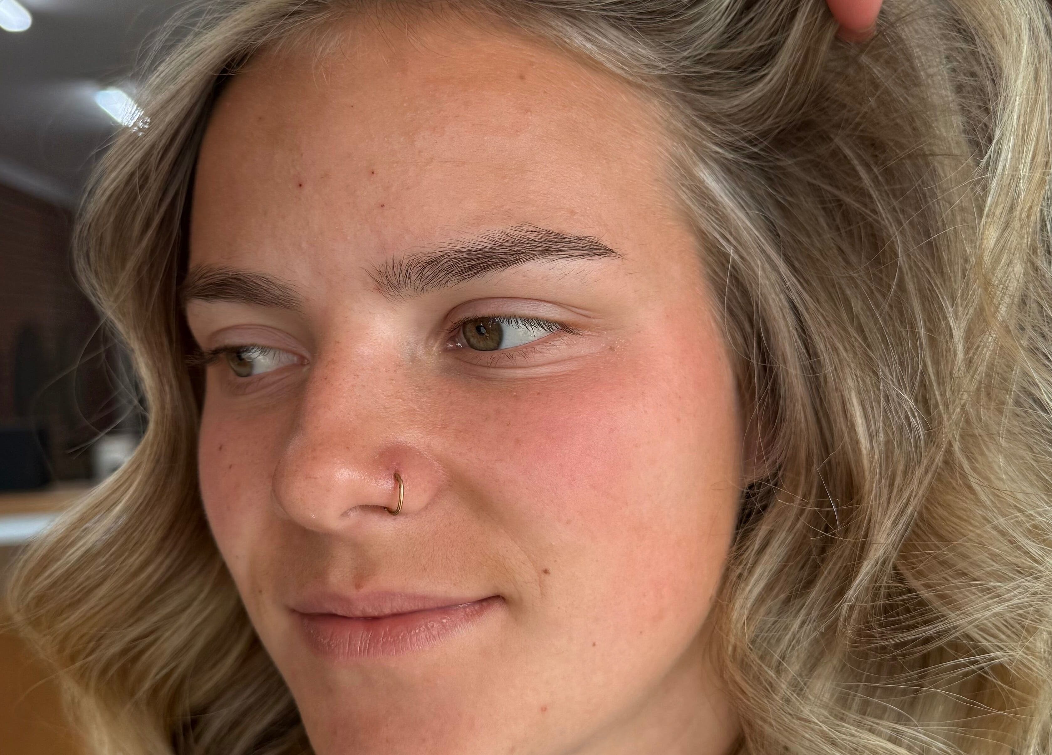 Close-up of blonde curls styled at Hair by Liv Ralph in Warragul, Victoria, AU.