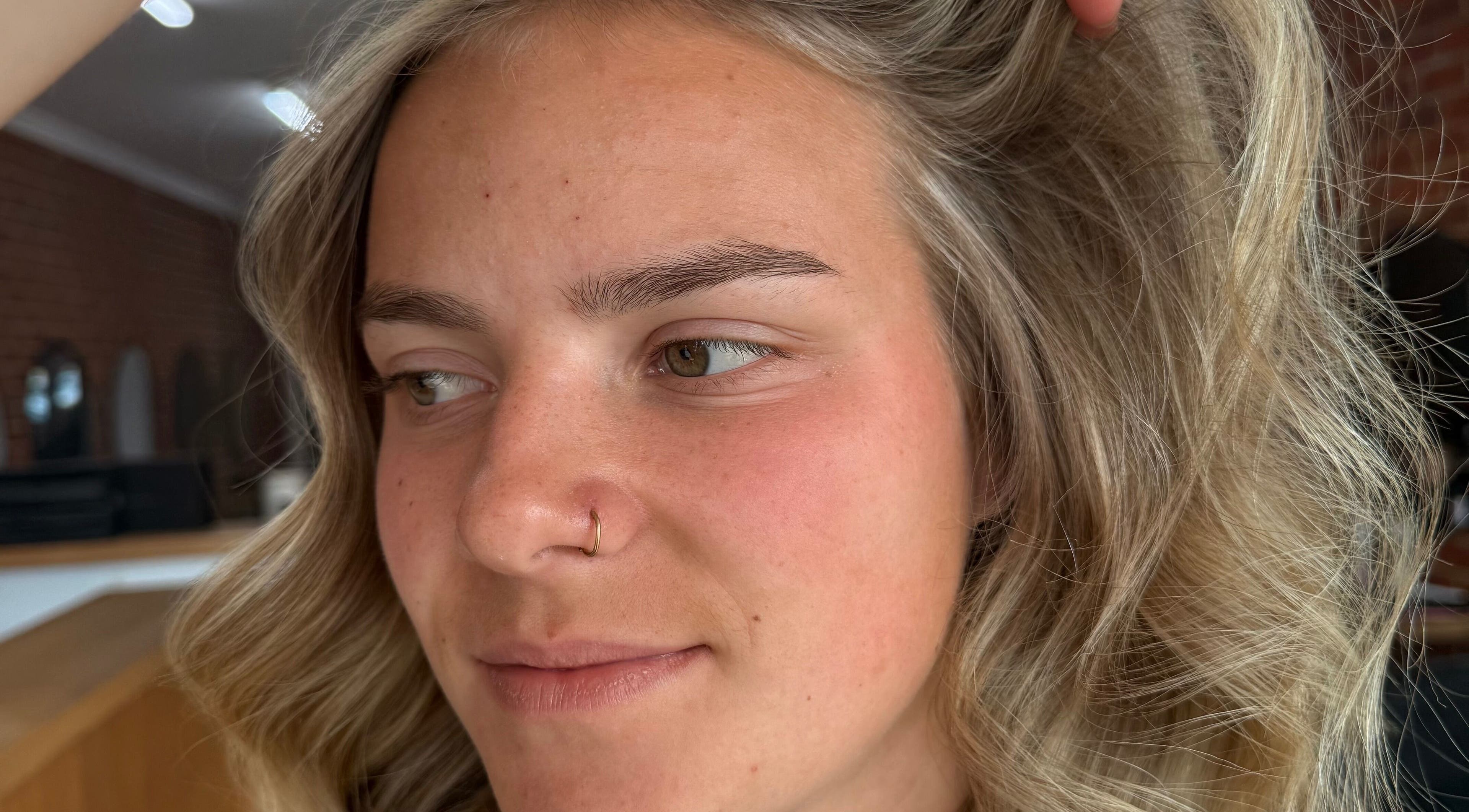 Close-up of blonde curls styled at Hair by Liv Ralph in Warragul, Victoria, AU.