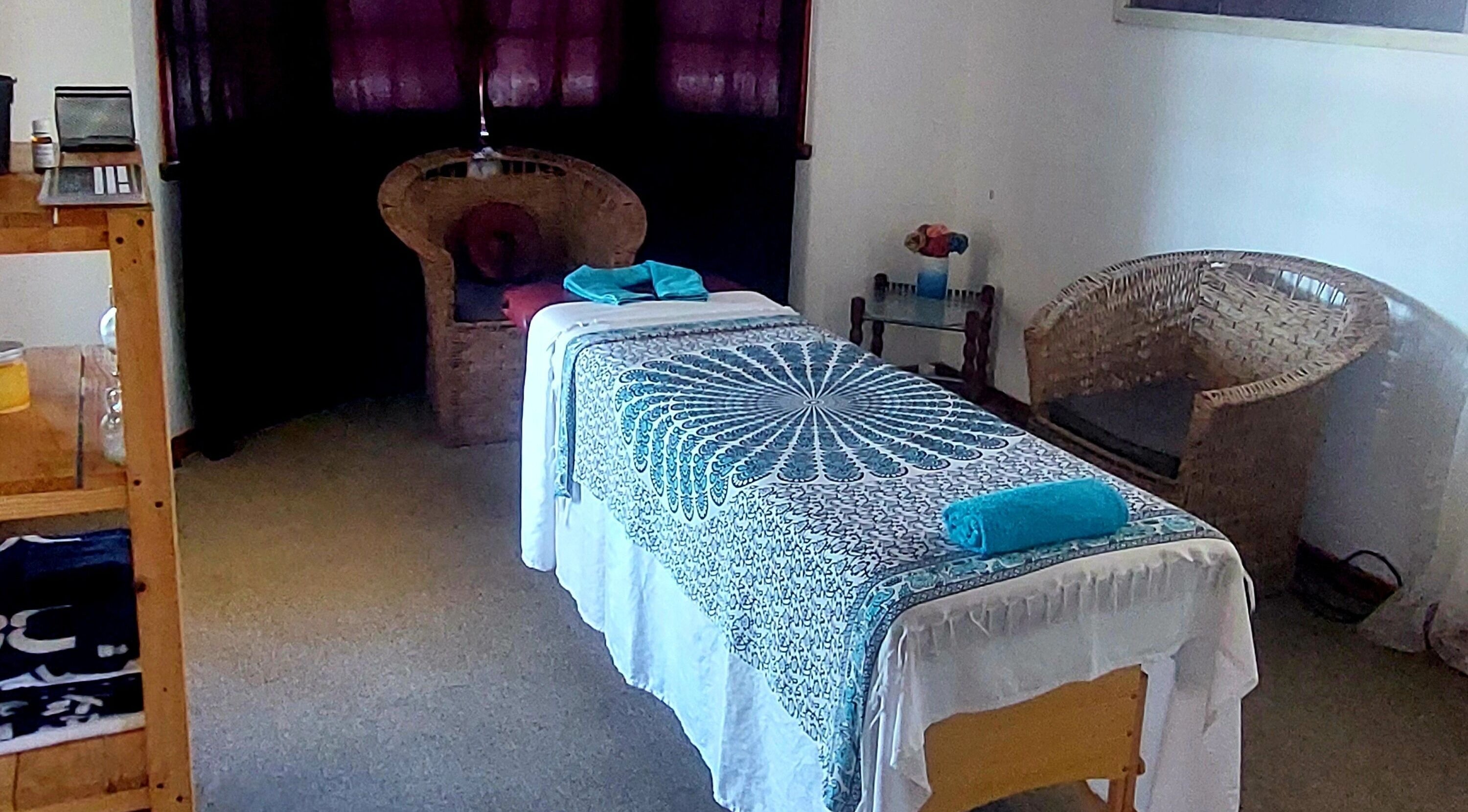 Cozy massage room at LomiLomi Therapeutic Massage in Jeffreys Bay, Eastern Cape, ZA.