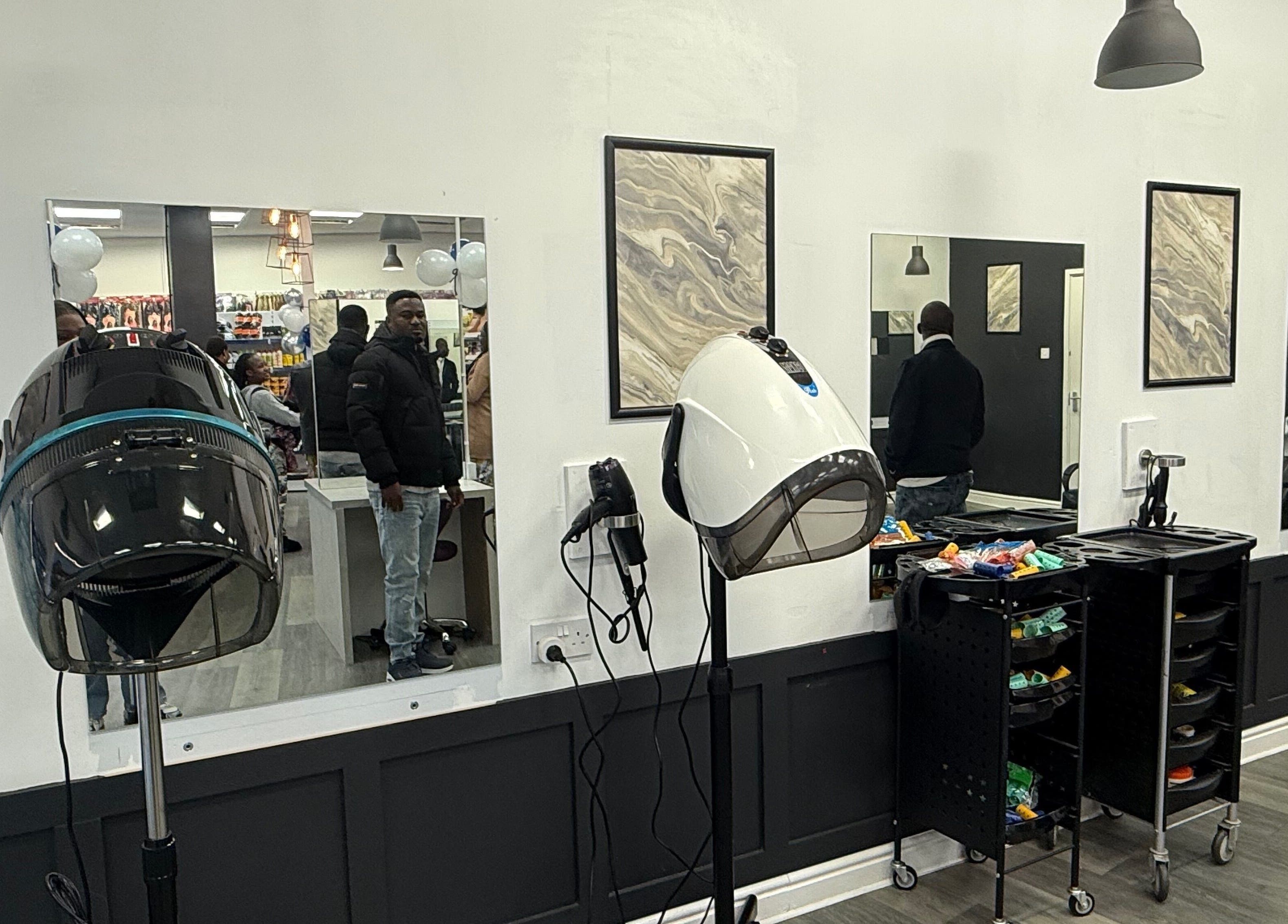 Modern interior of Bim-Gold hair and beauty salon in Huddersfield, England, GB with stylish equipment setup.