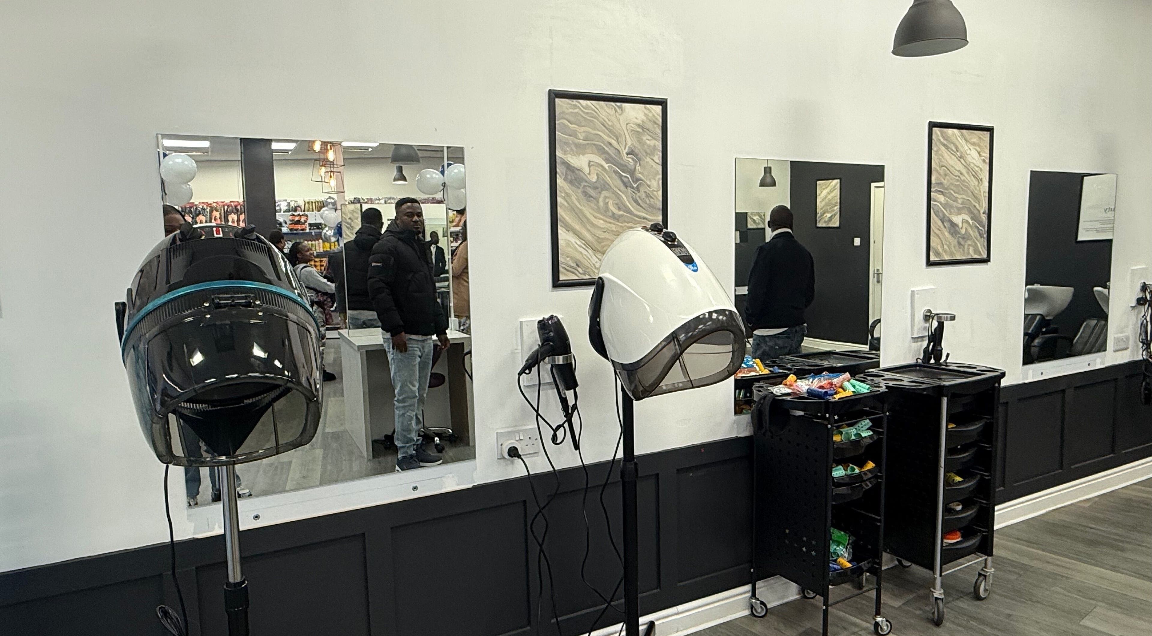 Modern interior of Bim-Gold hair and beauty salon in Huddersfield, England, GB with stylish equipment setup.