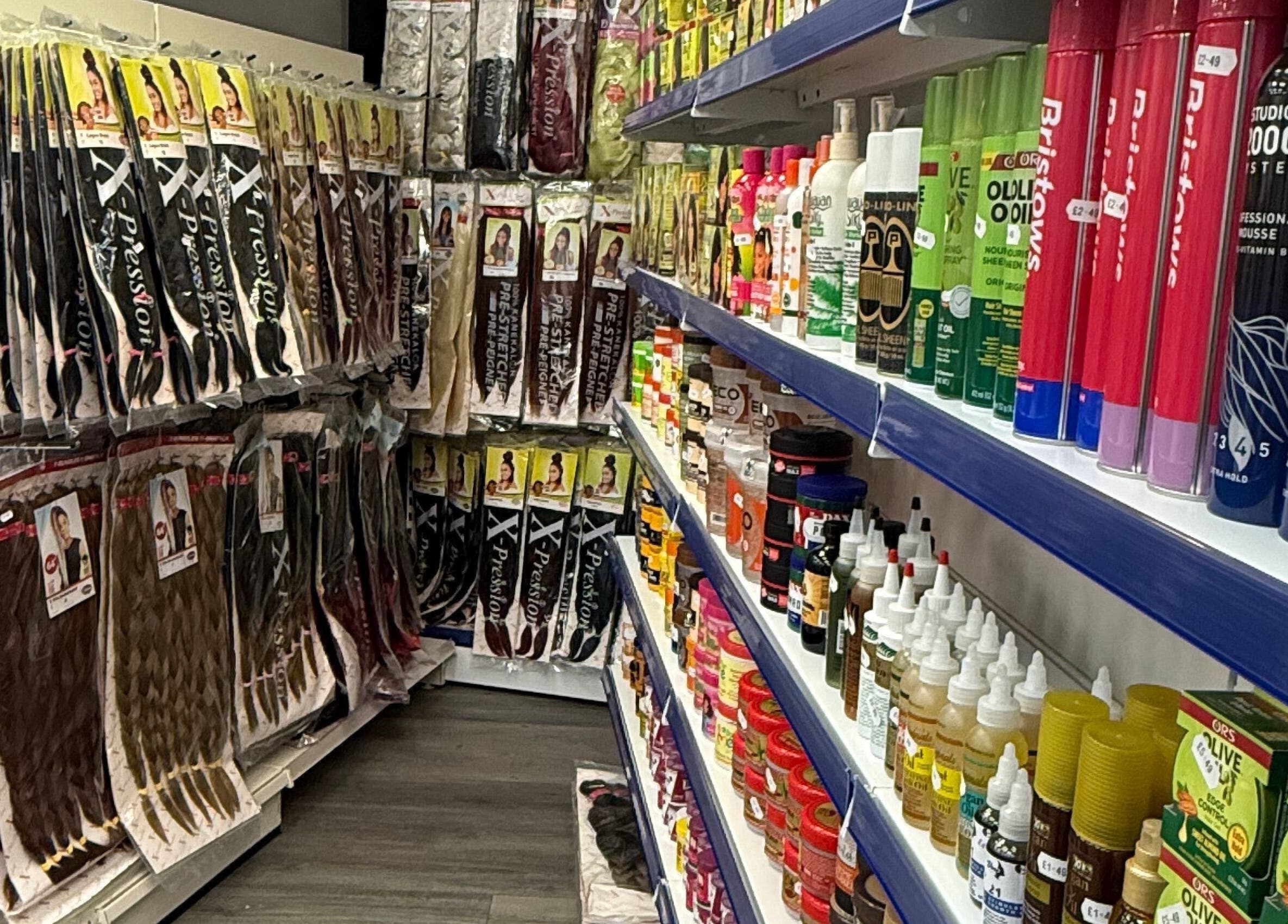 Vibrant beauty products at Bim-Gold hair and beauty salon, Huddersfield, England, GB. Hair and styling essentials neatly arranged.