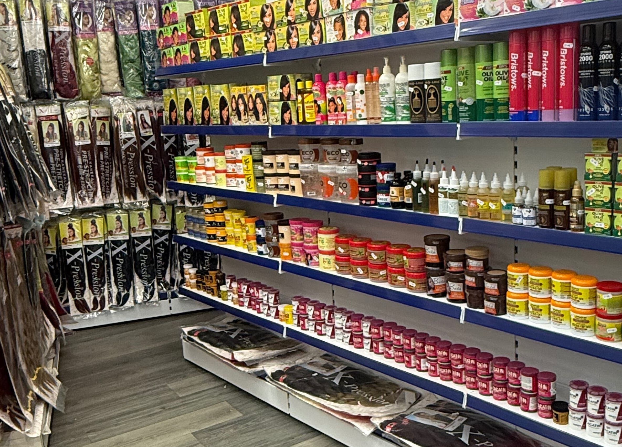 Hair and beauty products on shelves at Bim-Gold hair and beauty salon, Huddersfield, England, GB.