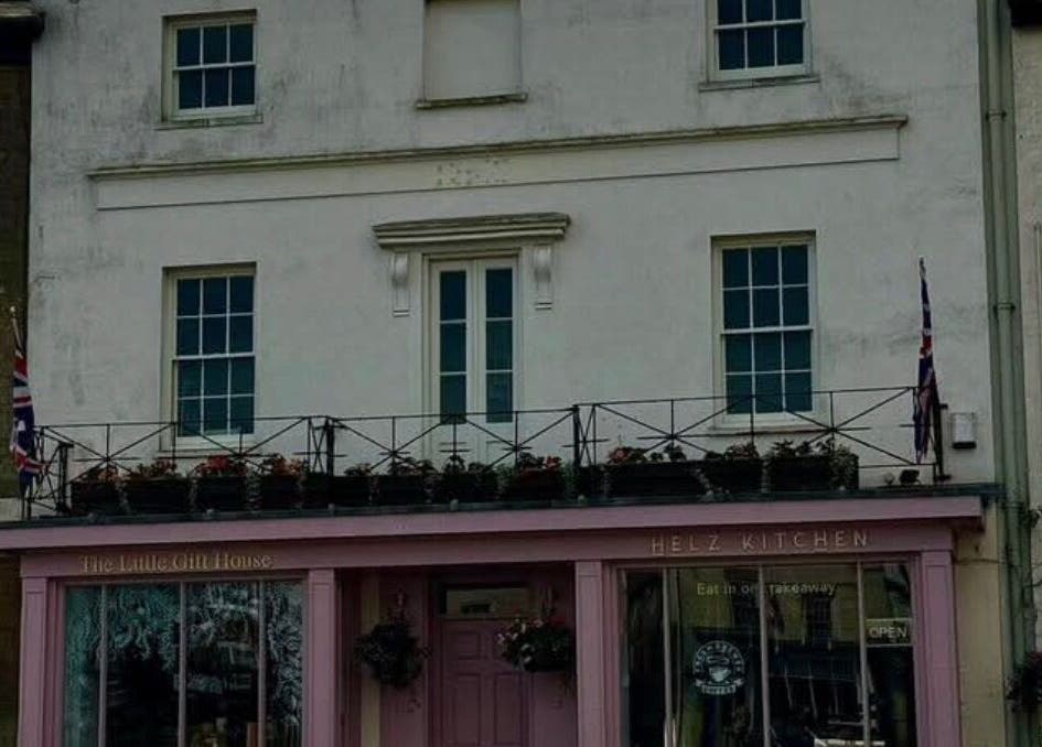 Front view of Chelsea Louise venue in Caistor, England, with classic architecture and floral accents.