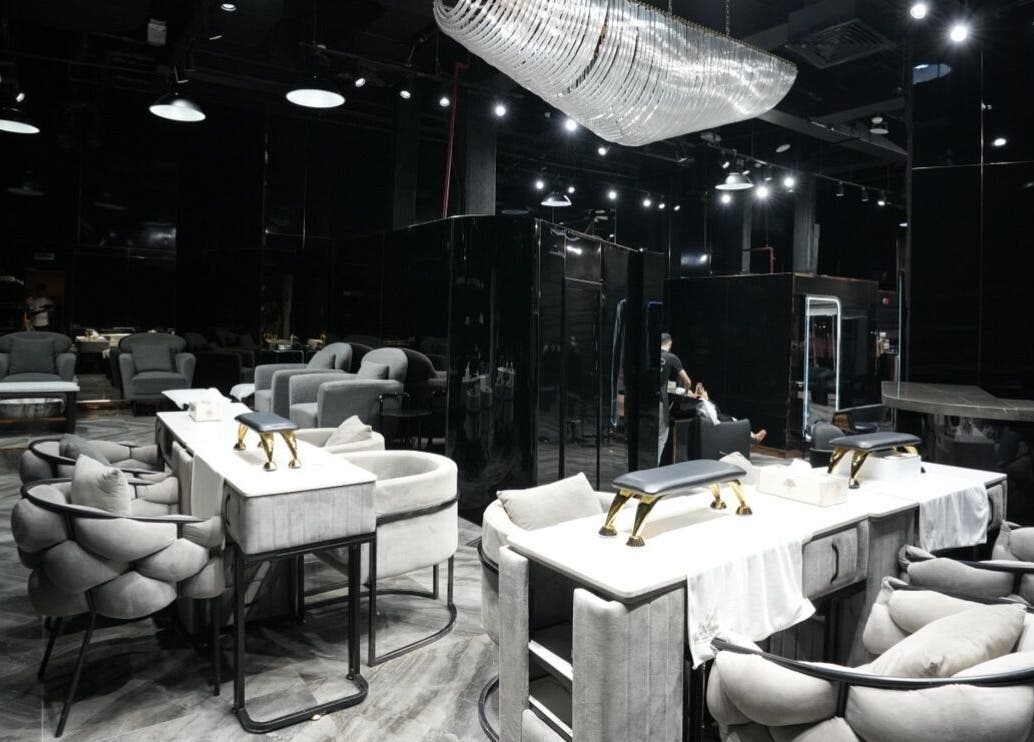 Elegant interior of Dolche House Beauty Lounge in Dubai, AE, featuring plush seating and modern decor.