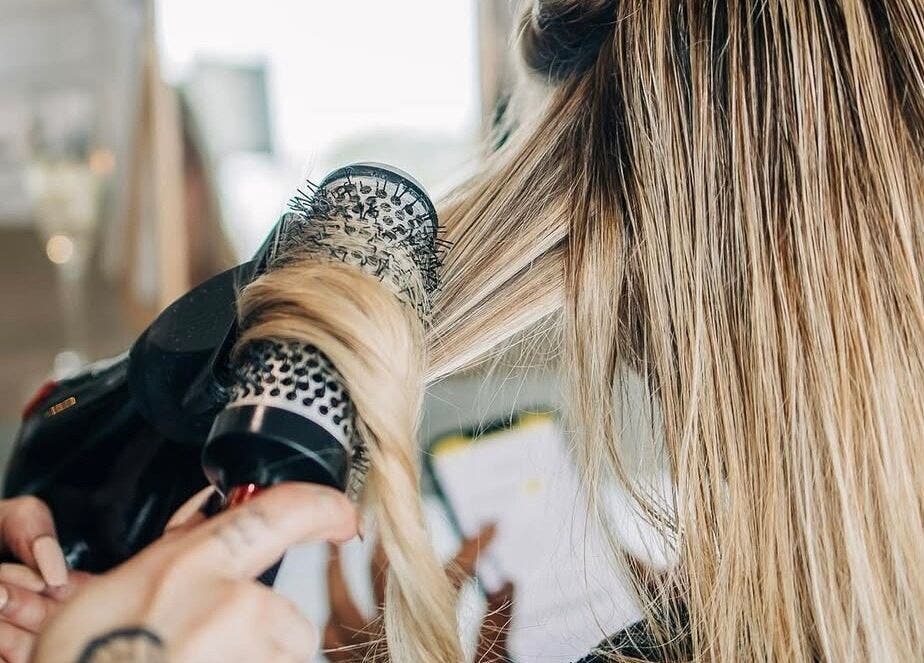 Professional blowout at PONY HAIR SOCIETY, The Junction, New South Wales, AU, enhancing blonde hair.