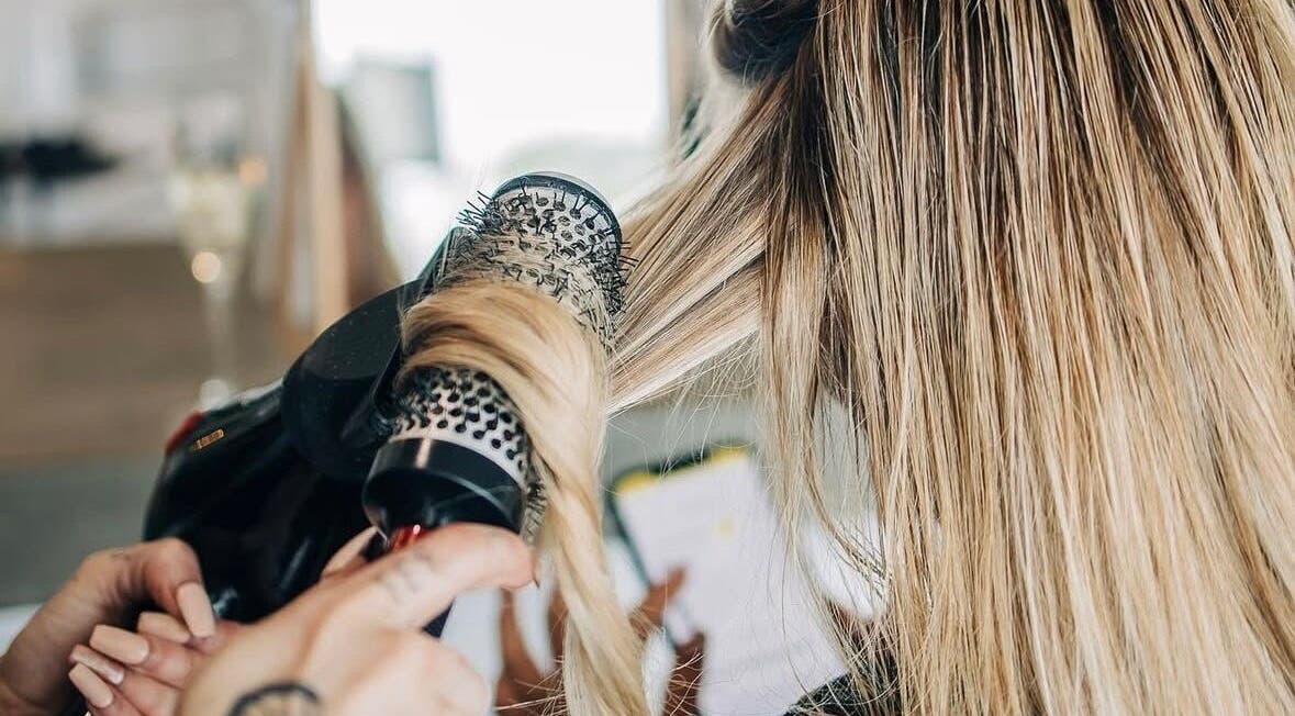 Professional blowout at PONY HAIR SOCIETY, The Junction, New South Wales, AU, enhancing blonde hair.