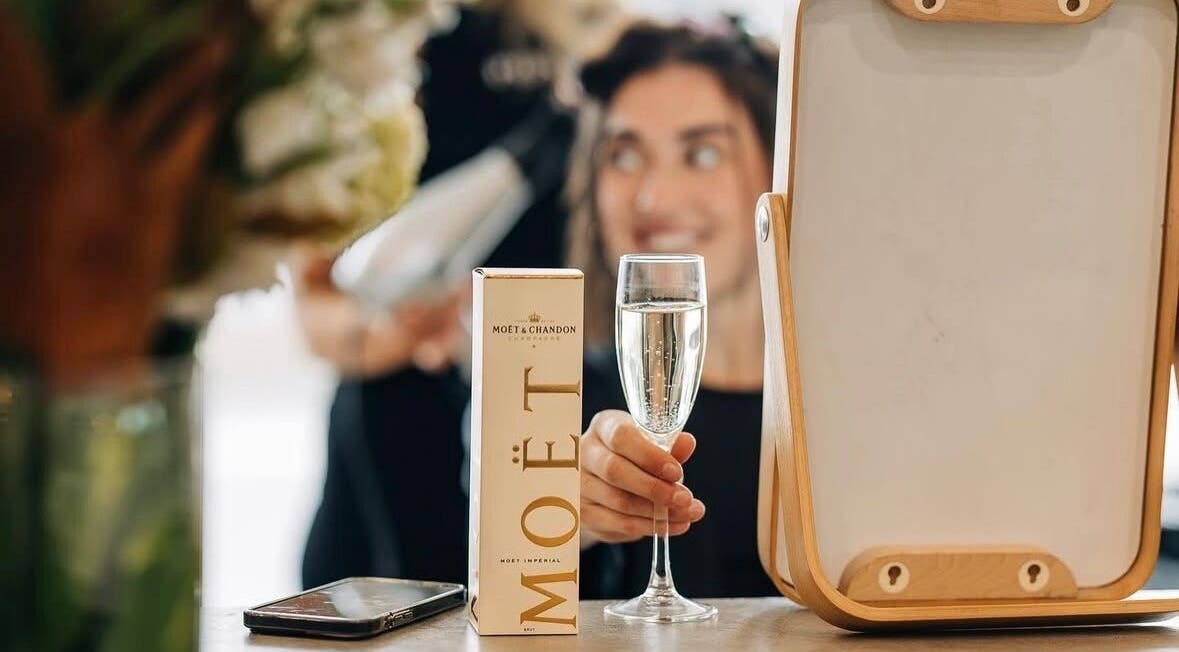 Enjoy a glass of Moët at PONY HAIR SOCIETY, The Junction, New South Wales, AU for a luxury experience.