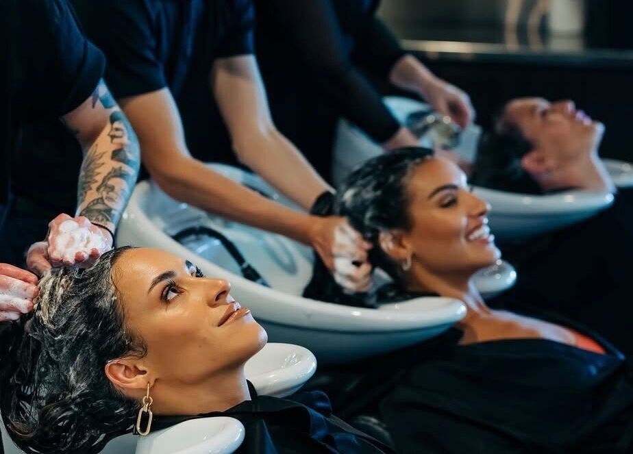 Guests enjoying a soothing hair wash at PONY HAIR SOCIETY, The Junction, New South Wales, AU.