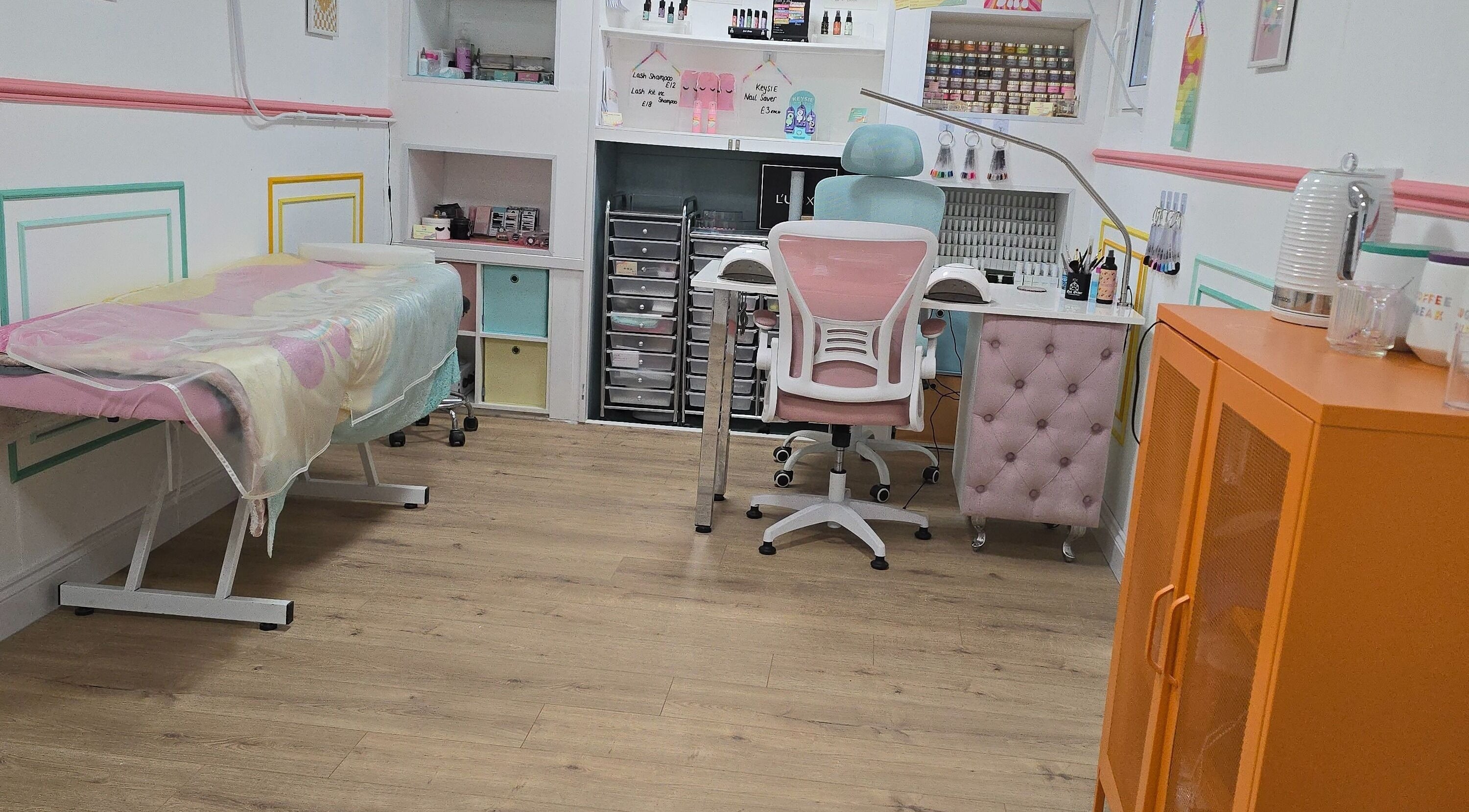 Flutterbynailsandbeauty salon interior in Runcorn, England with pastel decor and nail workstations.