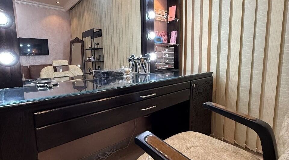 Makeup station at Rouge and Henna Beauty Saloon and Spa in Al Ain, Abu Dhabi, AE featuring professional tools.