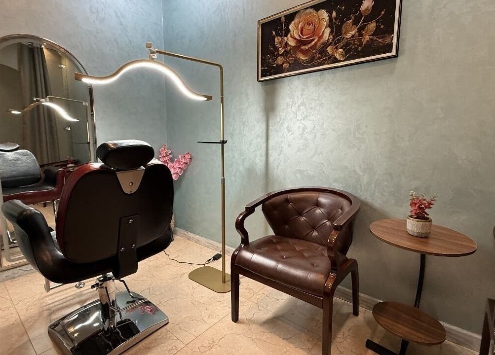 Sophisticated salon interior at Rouge and Henna Beauty Saloon and Spa, Al Ain, Abu Dhabi, AE, with luxurious seating.