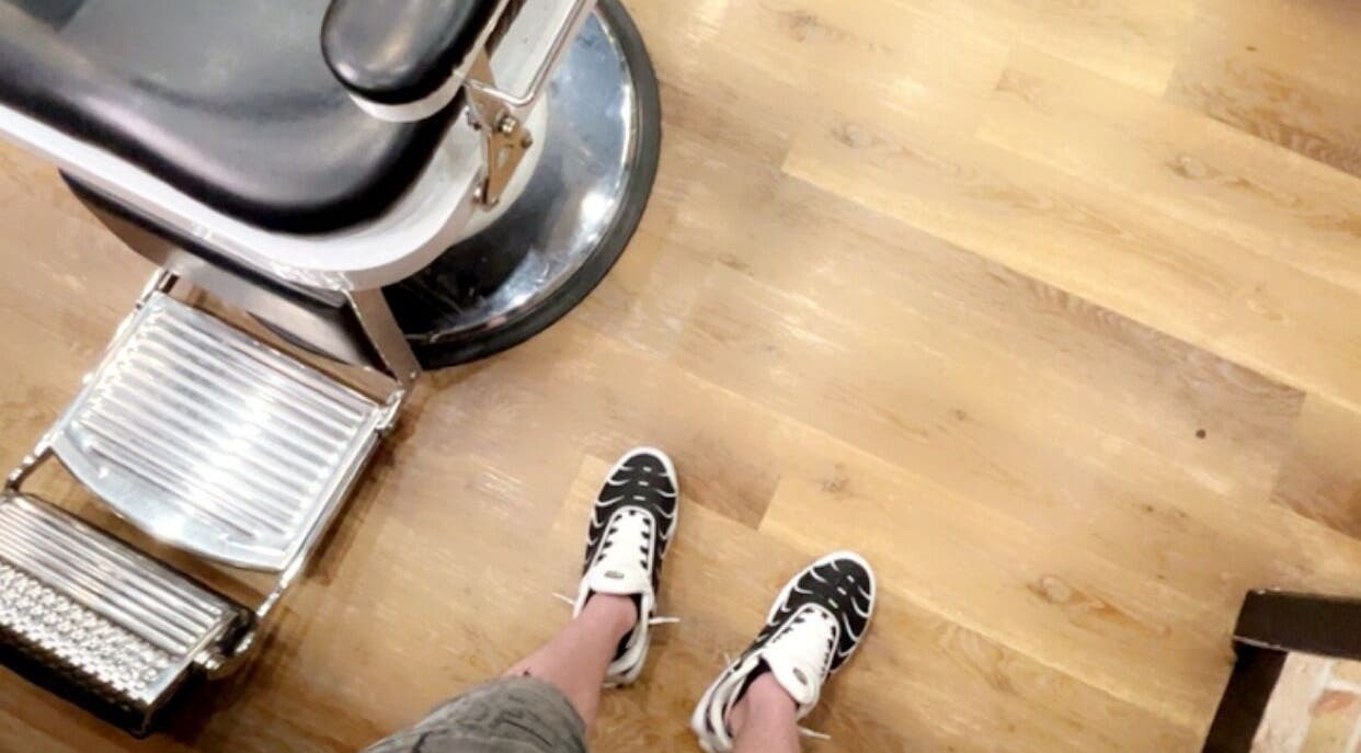 Barber chair and stylish sneakers at Luxbarber43 in Hamilton, New South Wales, AU. Awaiting a fresh cut.