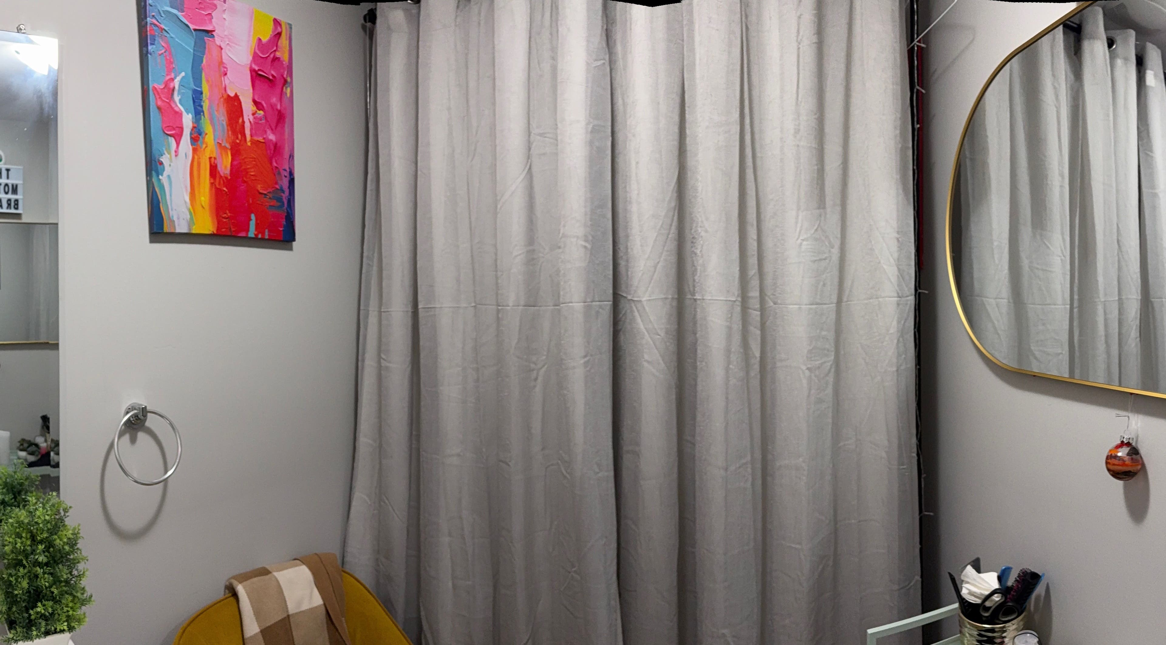 Chic room at The Mother in Halifax, Nova Scotia, CA, with abstract wall art and cozy seating for relaxation.