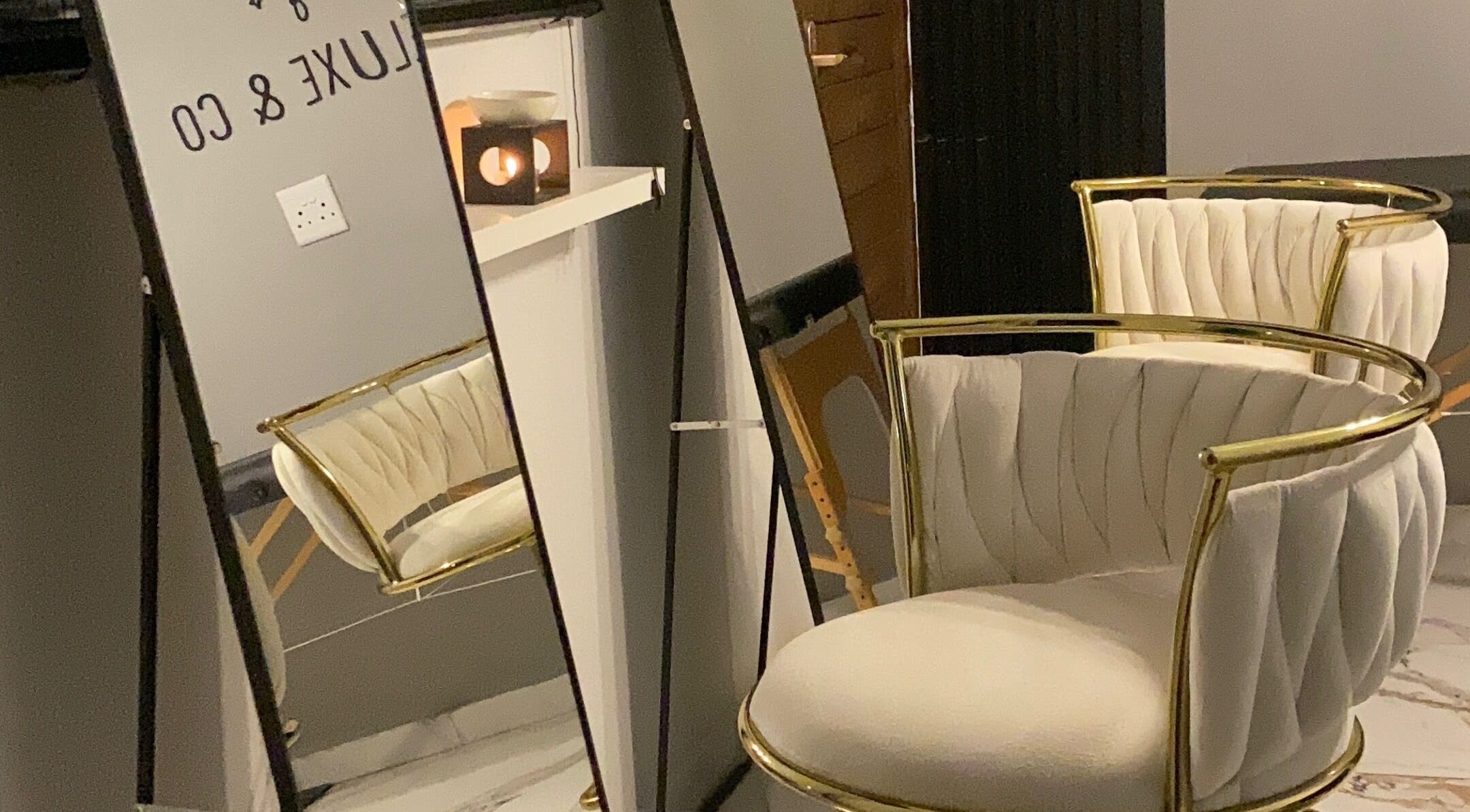 Elegant chair and mirror setup at Kaéluxe&Co Beauty Studio in Soweto, Gauteng, ZA.