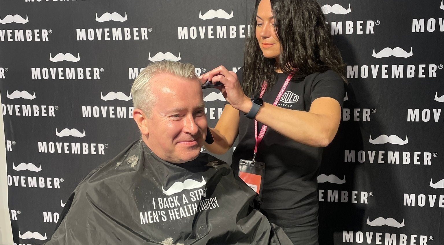 Stylist at Mila's head office in Bournemouth, England, GB, participating in Movember haircut event.