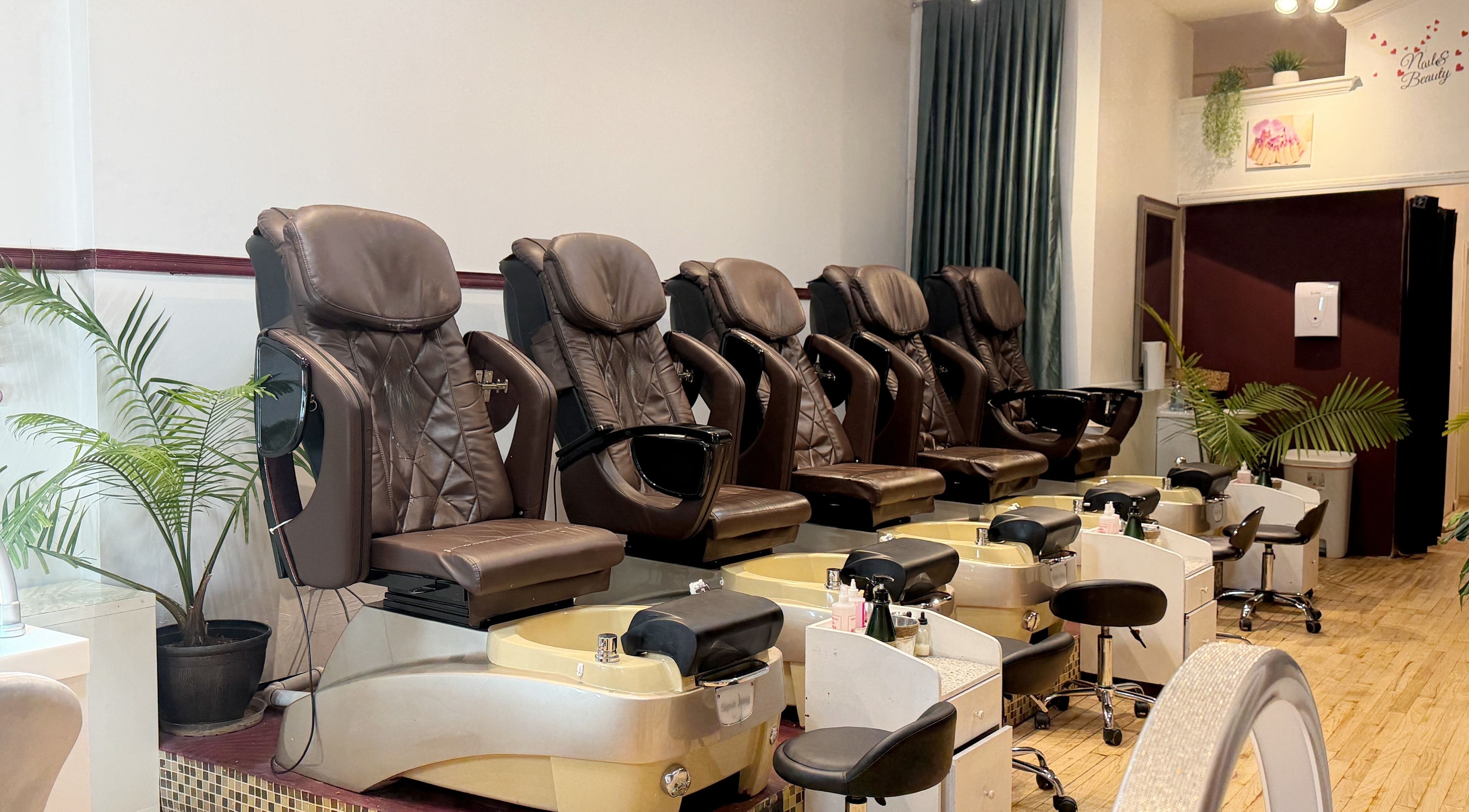 Luxurious pedicure chairs at The Nail Bar on Division, Chicago, Illinois, US offering relaxing treatments.