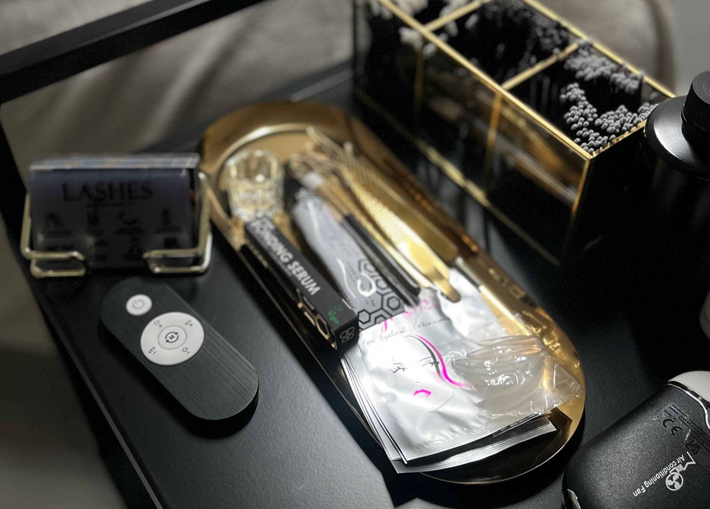 Beauty tools and products at Lash Al-Noor, London, England, GB displayed neatly for eyelash treatments.