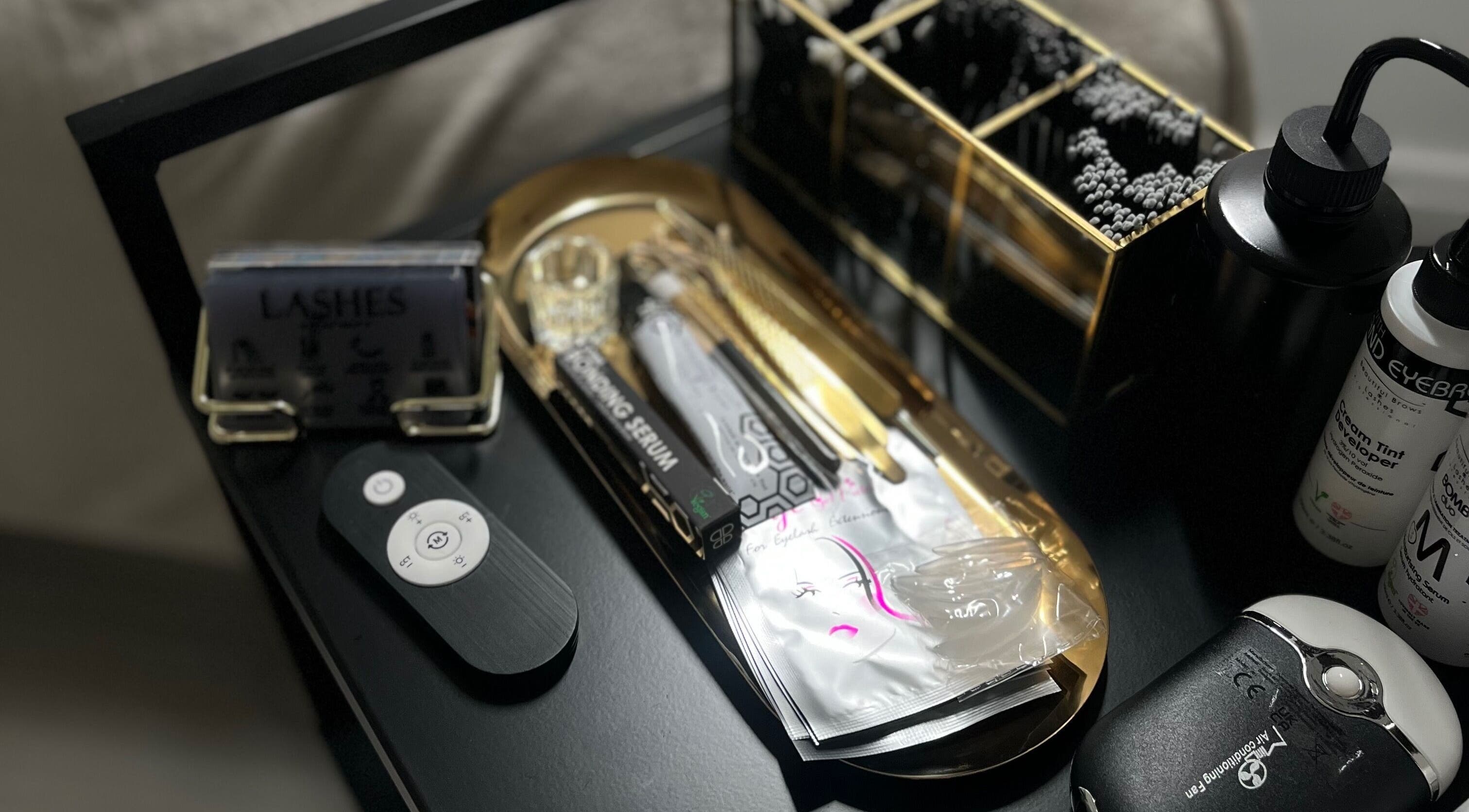 Beauty tools and products at Lash Al-Noor, London, England, GB displayed neatly for eyelash treatments.