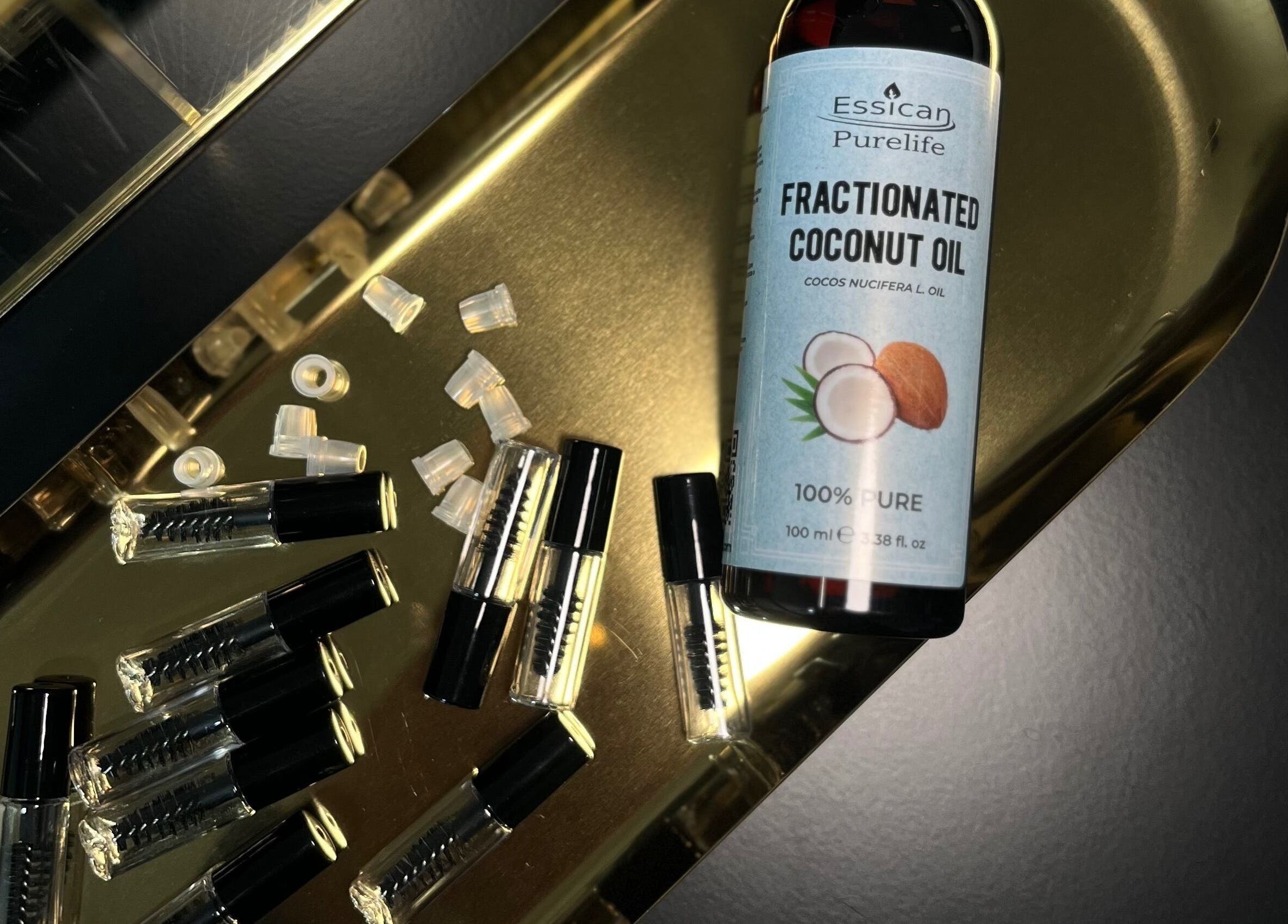 Fractionated coconut oil with lash vials at Lash Al-Noor, London, England, GB.