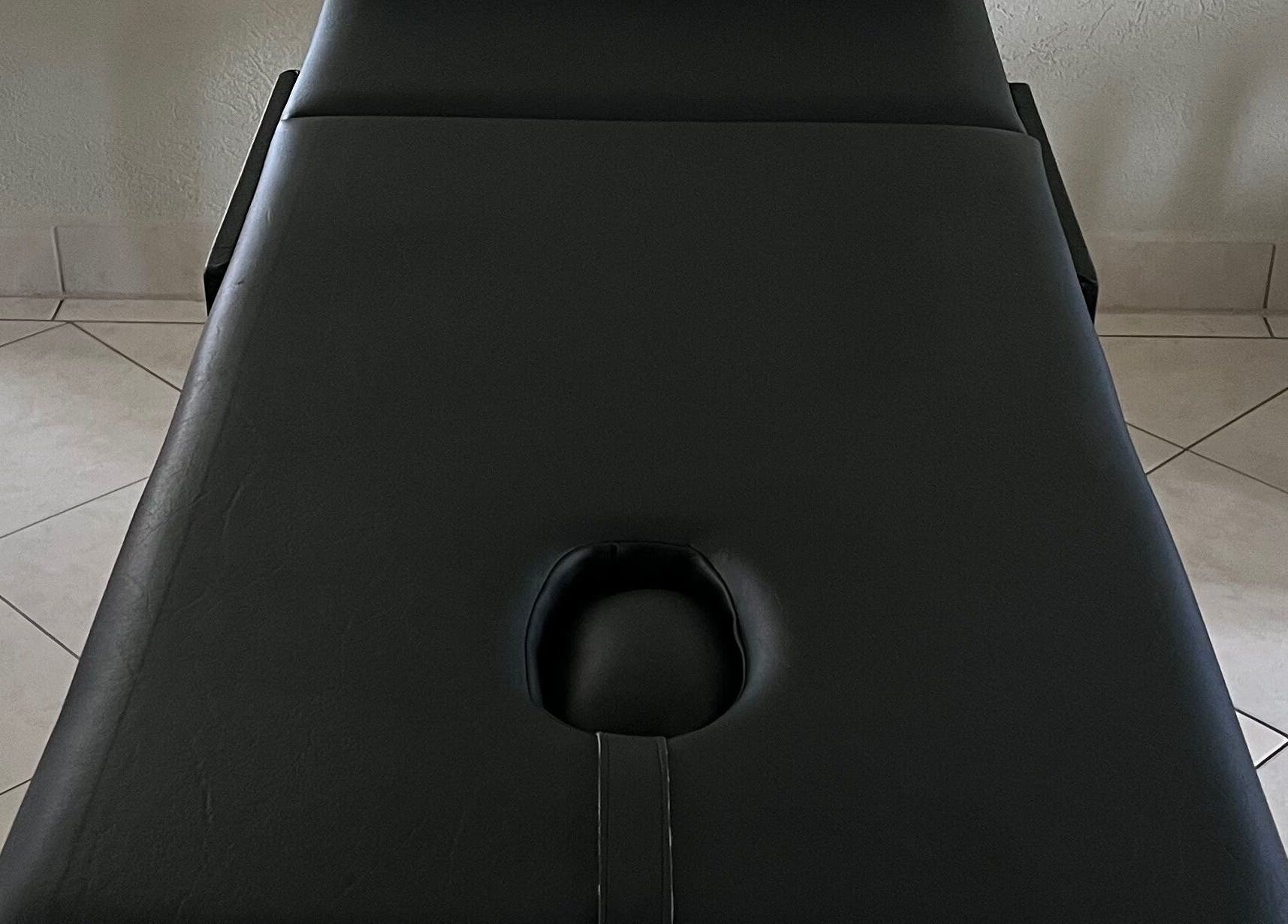 Comfortable massage table at Kinetix Wellness, Bridgetown, Saint Michael, BB, ideal for relaxation.