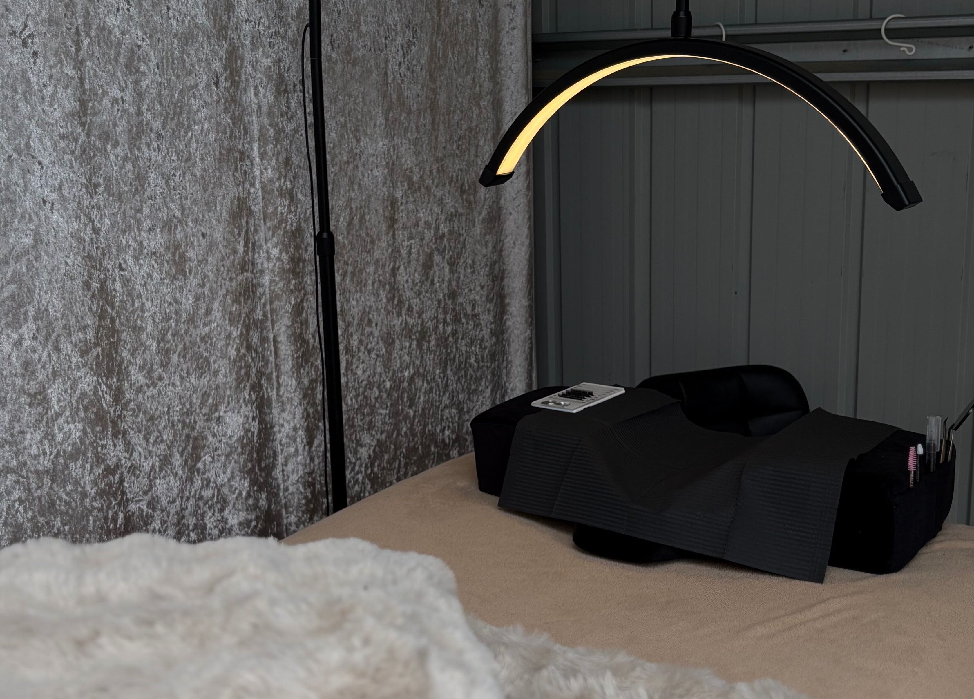 Comfortable beauty treatment area at Lashed By Mirai in Ravenswood, Tasmania, AU with gentle lighting.