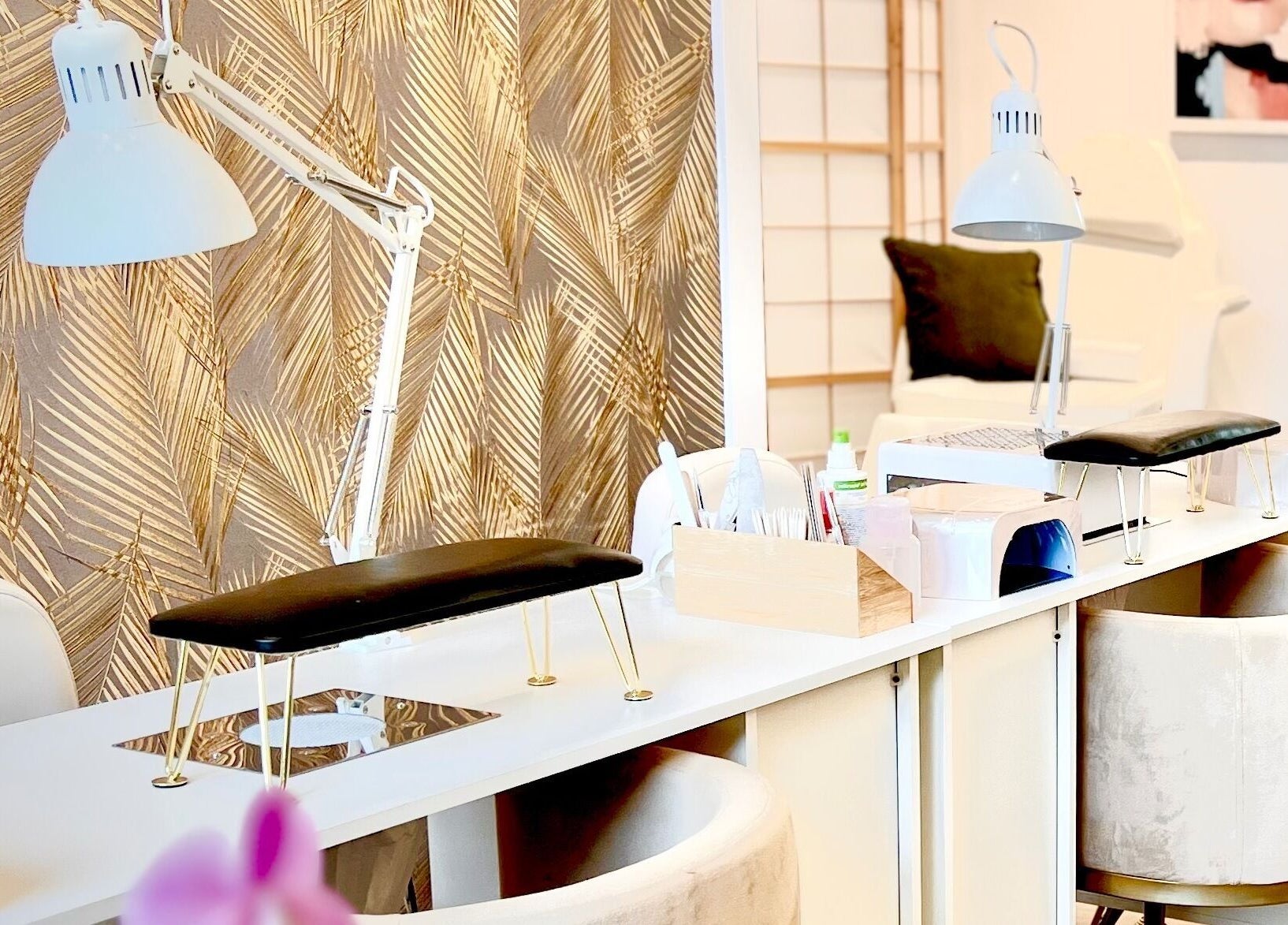 Luxurious nail stations at Aether beauty nails, Glifada, GR, featuring modern decor and sleek lighting.