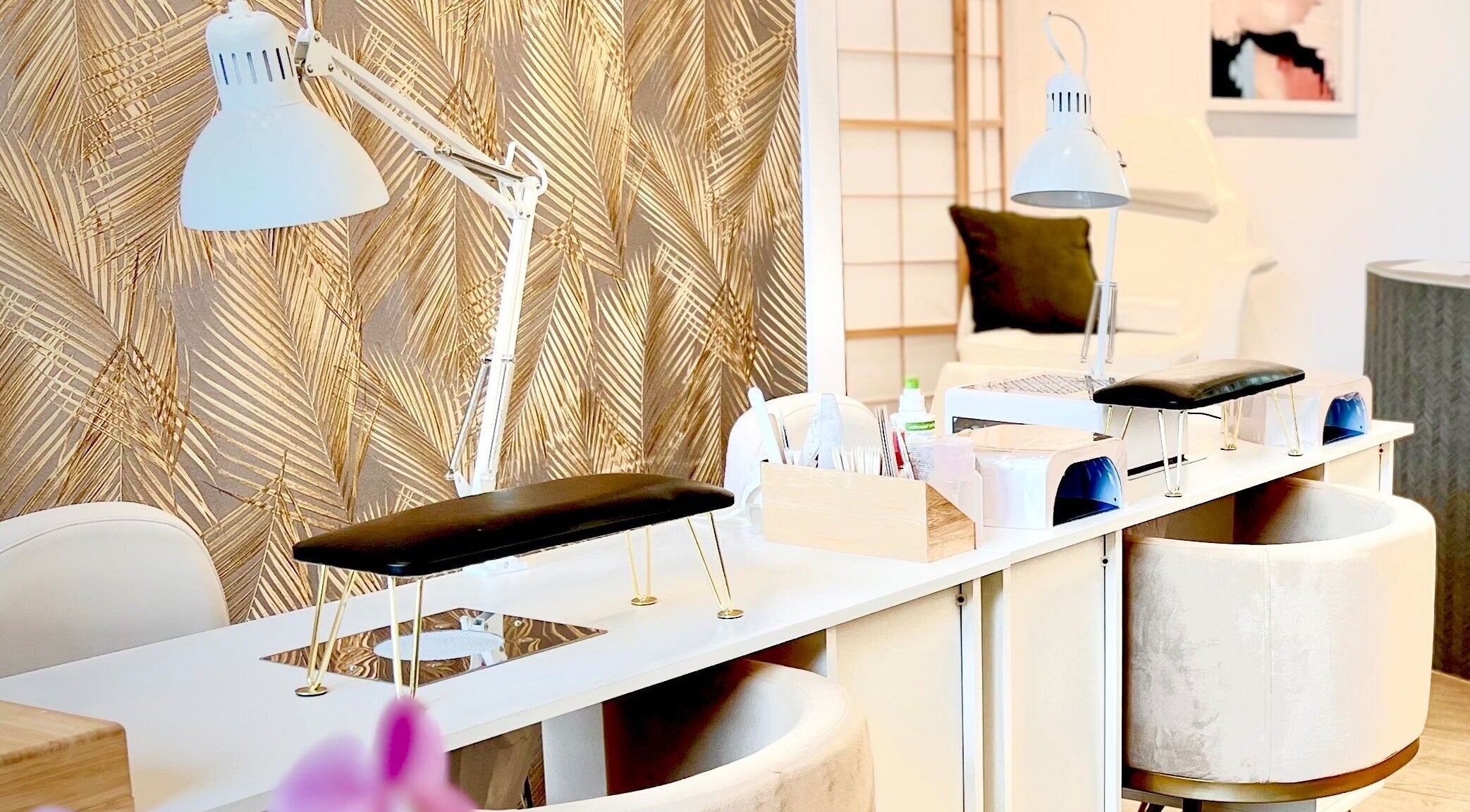 Luxurious nail stations at Aether beauty nails, Glifada, GR, featuring modern decor and sleek lighting.