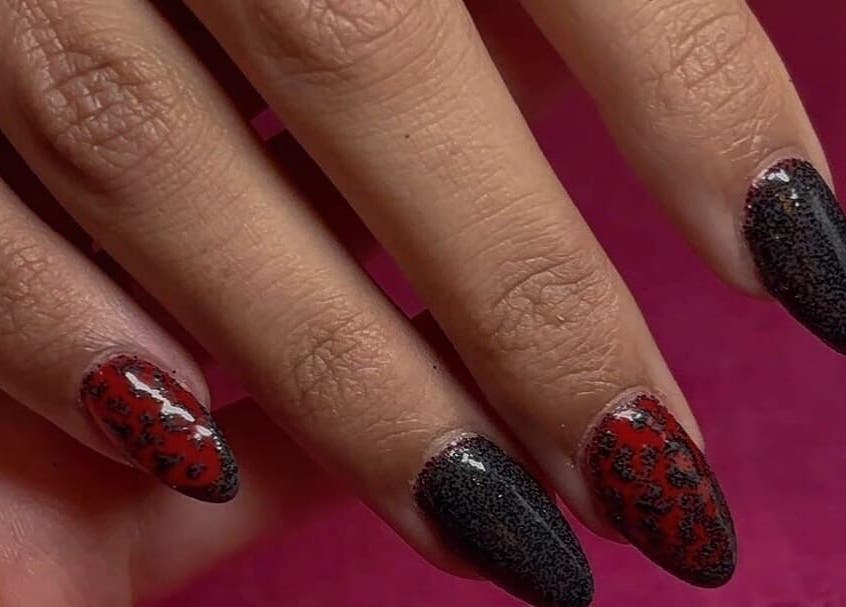 Chic black and red nail art at Nail Design by Ellie, Luton, England, GB.