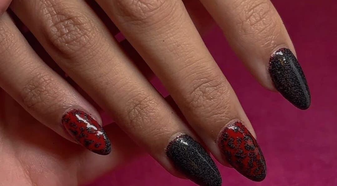 Chic black and red nail art at Nail Design by Ellie, Luton, England, GB.