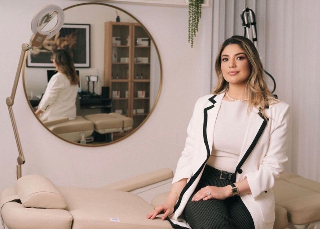 Professional at Clinica Luzé, Turramurra, New South Wales, AU, in a chic wellness room.