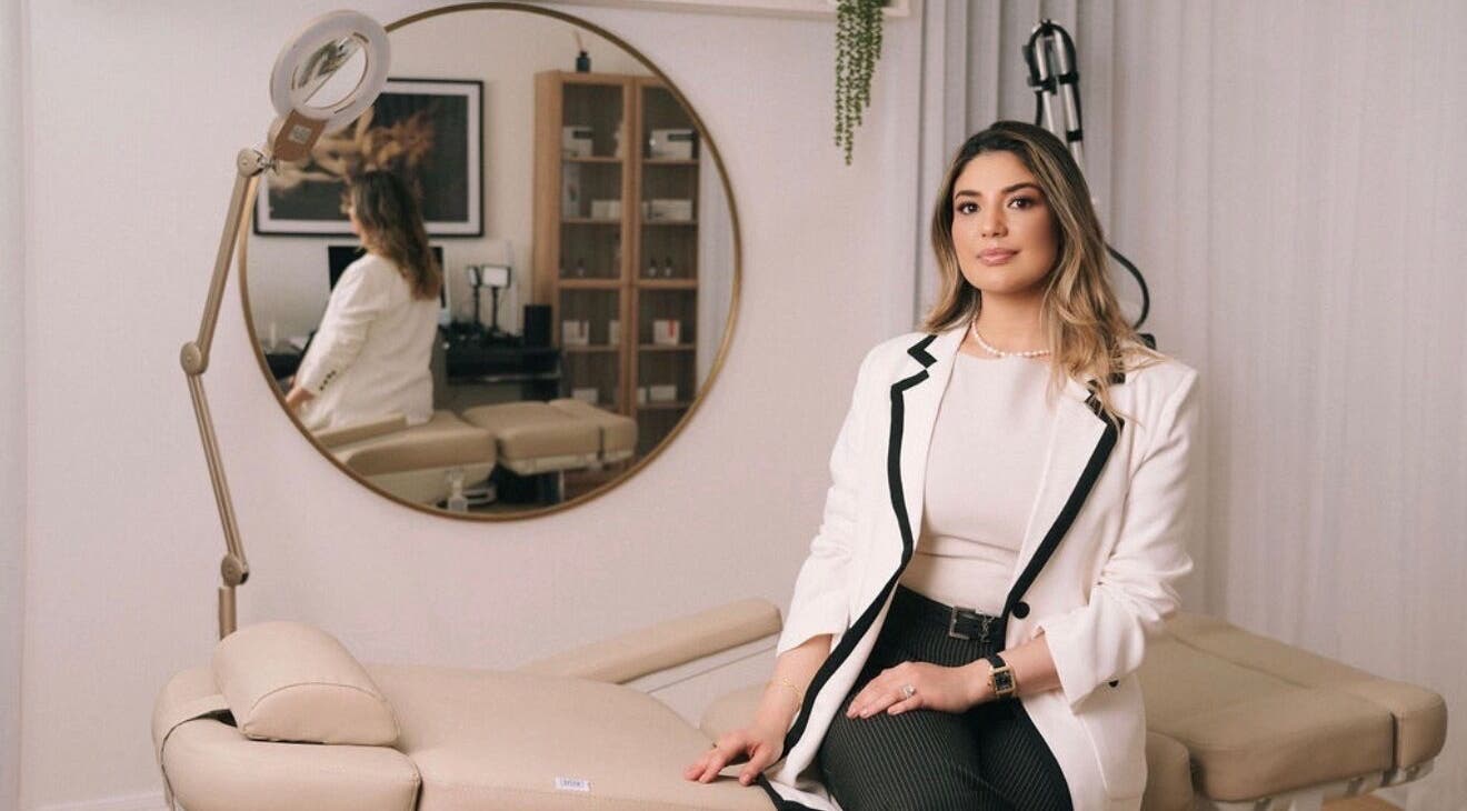 Professional at Clinica Luzé, Turramurra, New South Wales, AU, in a chic wellness room.